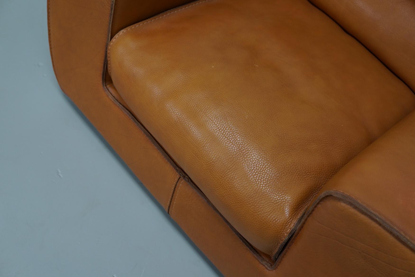 Mid-Century Modern Roche Bobois Club Chair In Tan / Cognac Neck Leather – France, circa 1980 For Sale
