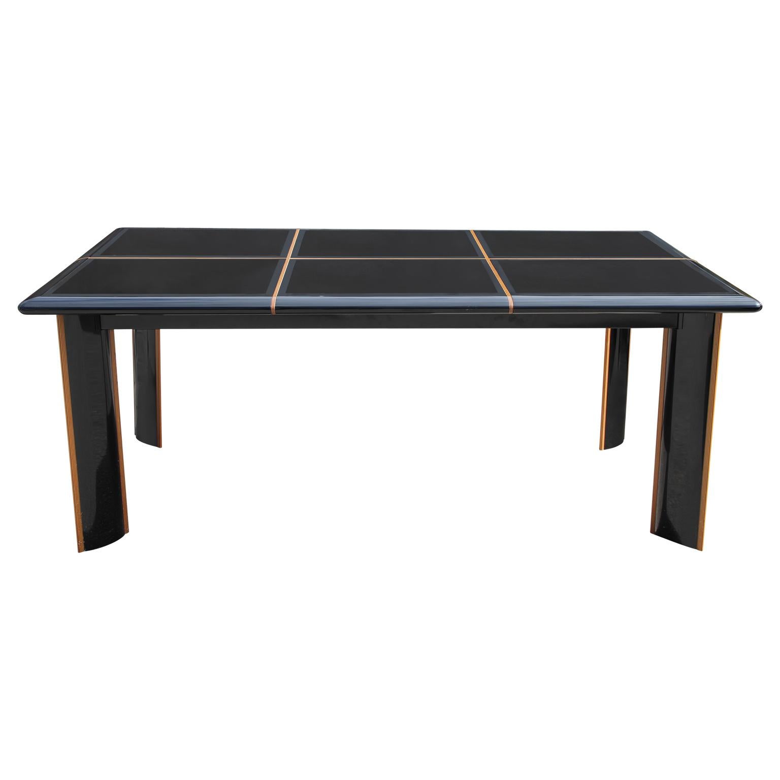 Postmodern Roche Bobois for Pierre Cardin Italian high gloss black lacquer dining table. In beautiful condition. Has one leaf. 

Dimensions of Table Without the Leaf: H 30 in. x W 74 in. x D 39 in. 