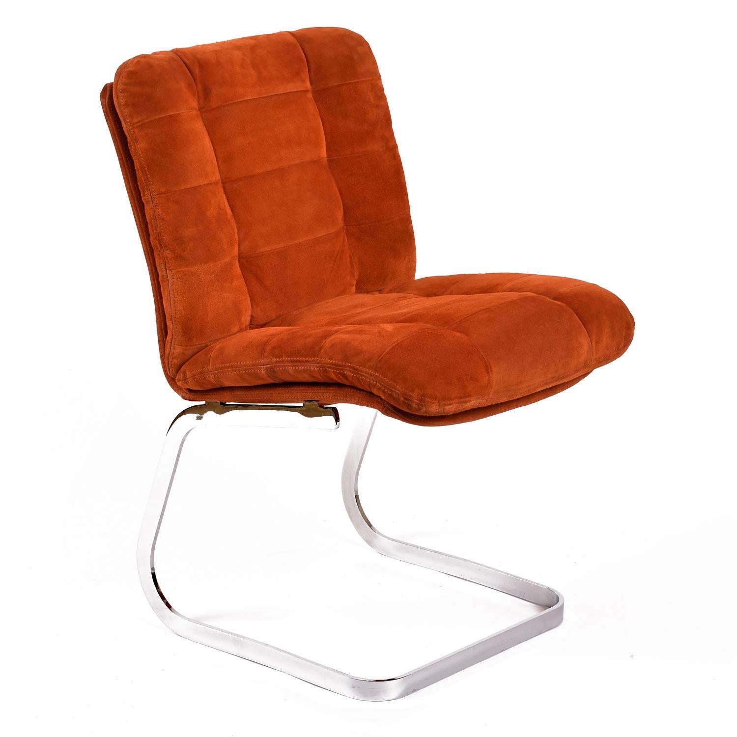We just had these professionally cleaned and detailed. 

Original set of (6) exquisite Roche Bobois dining / side chairs. These channel tufted burnt orange suede chairs are equal parts 70's glamorous and modern. The original chrome finish has been