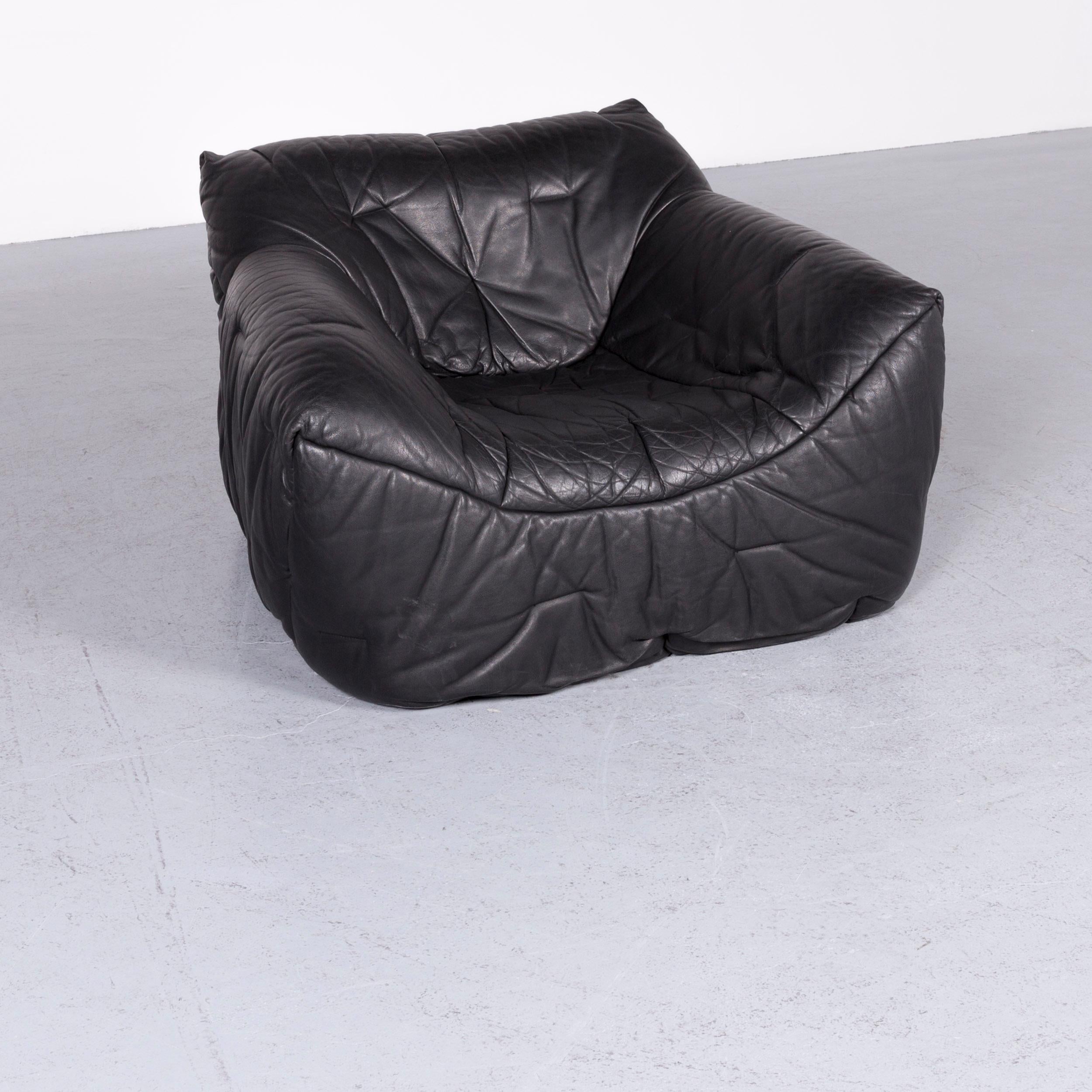 We bring to you a Roche Bobois Informel designer leather armchair black one-seat couch.



























 