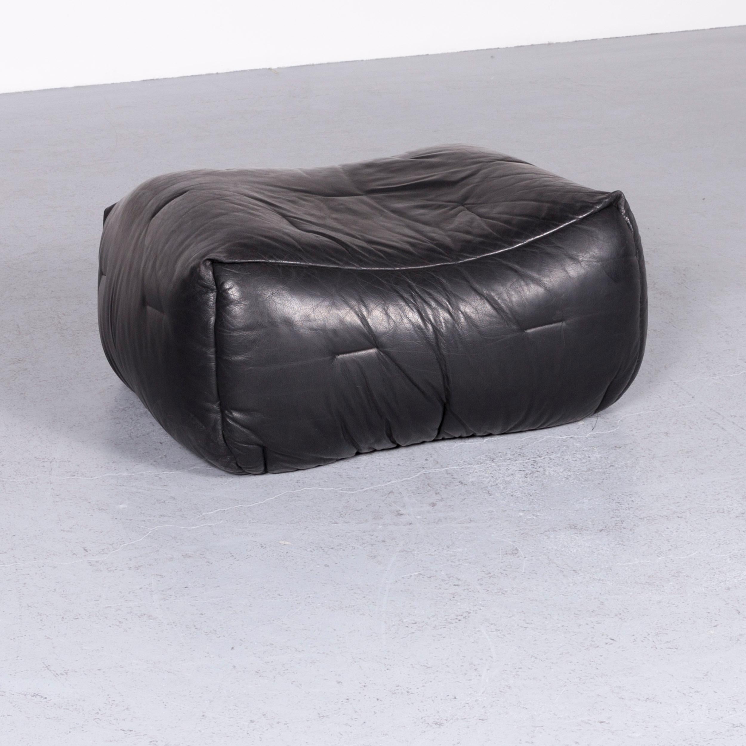 We bring to you a Roche Bobois informel designer leather footstool black. 





























 