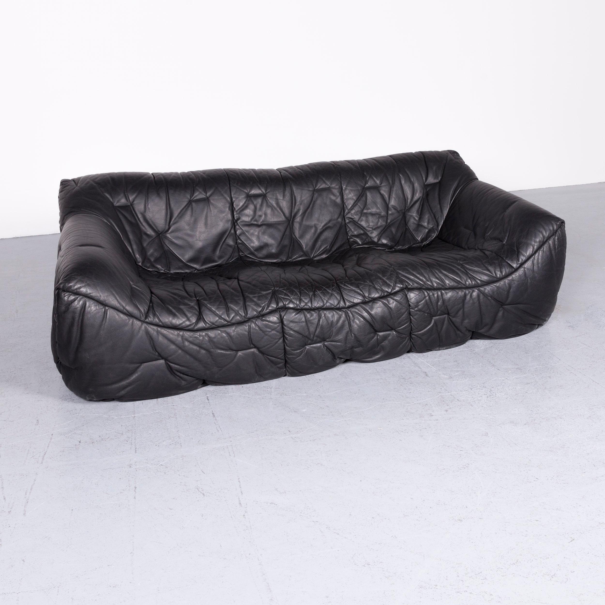 We bring to you a Roche Bobois Informel designer leather sofa black three-seat couch.

























