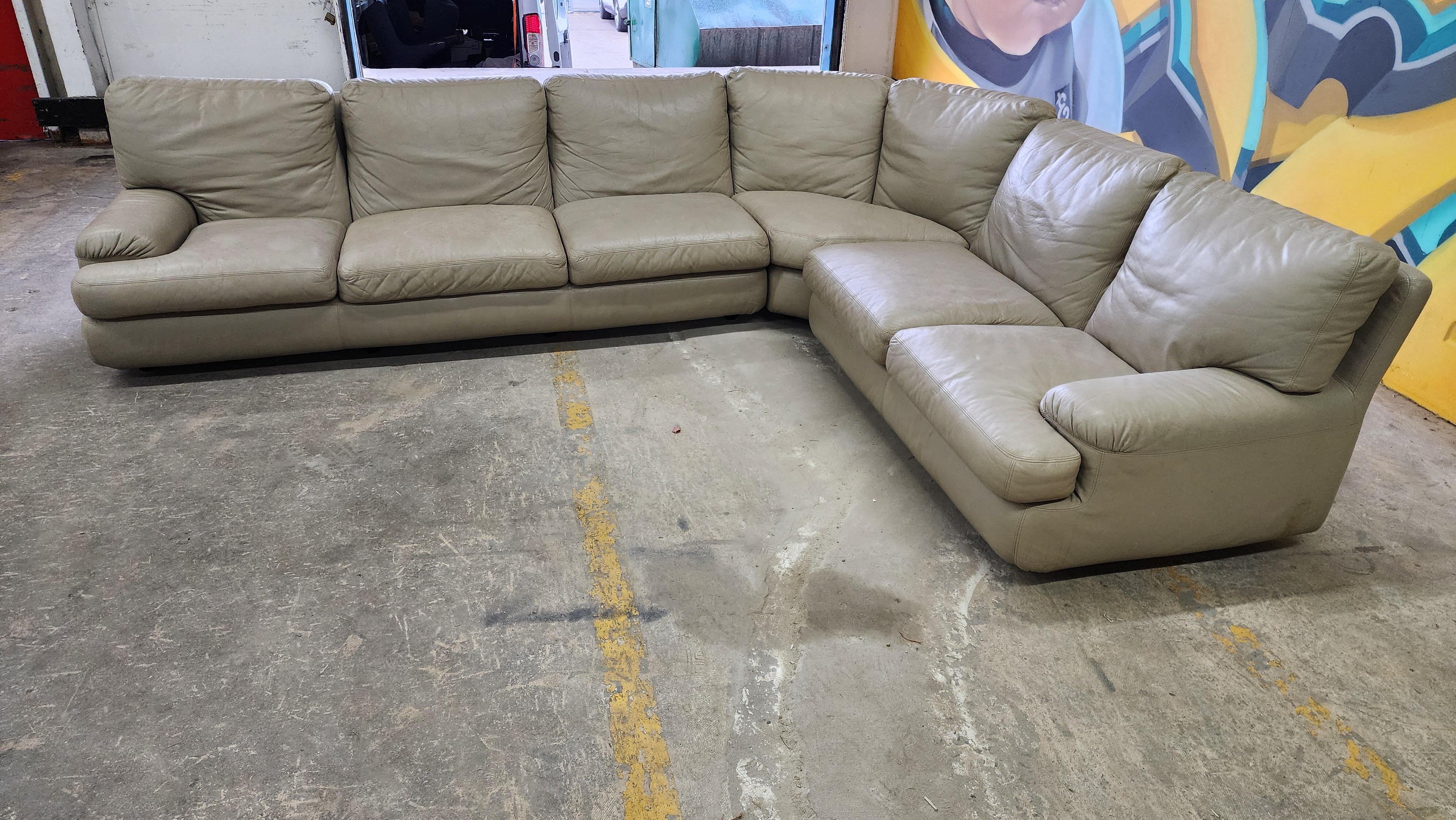 A three piece leather sectional sofa by Roche Bobois. removable cushions with velco to secure them to the sofa frame.  very comfortable. 