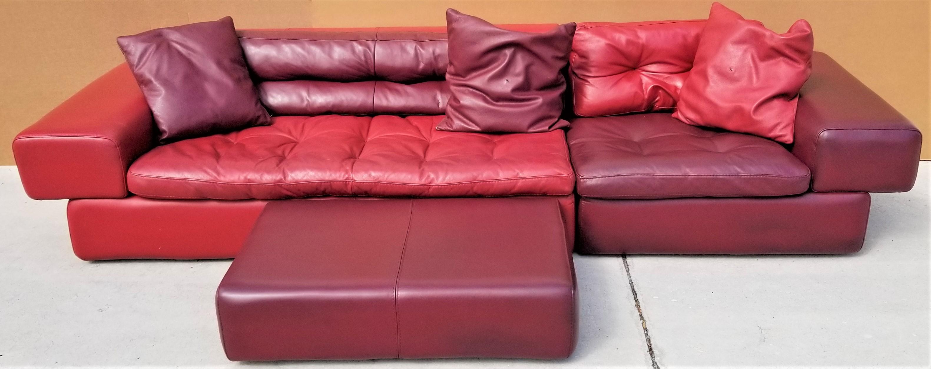 Offering one of our recent Palm Beach Estate fine furniture acquisitions of a
3 piece low-profile Roche Bobois leather sectional sofa with ottoman, 3 pillows in 2 tones of red
All the cushions zipper onto the base to keep them in place.
This is a
