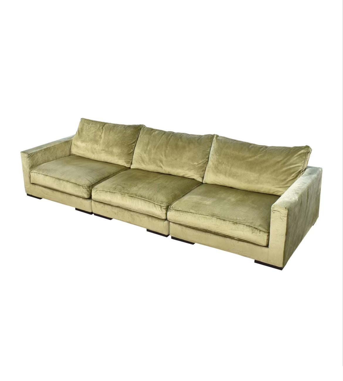 Stunning olive green couch from Roche Bobois in a luxurious chenille or velvet fabric.

This “Long Island” model currently retails for over $30,000. 

The fabric reflects light creating a luminous and rich appearance.

The couch is large and deep.