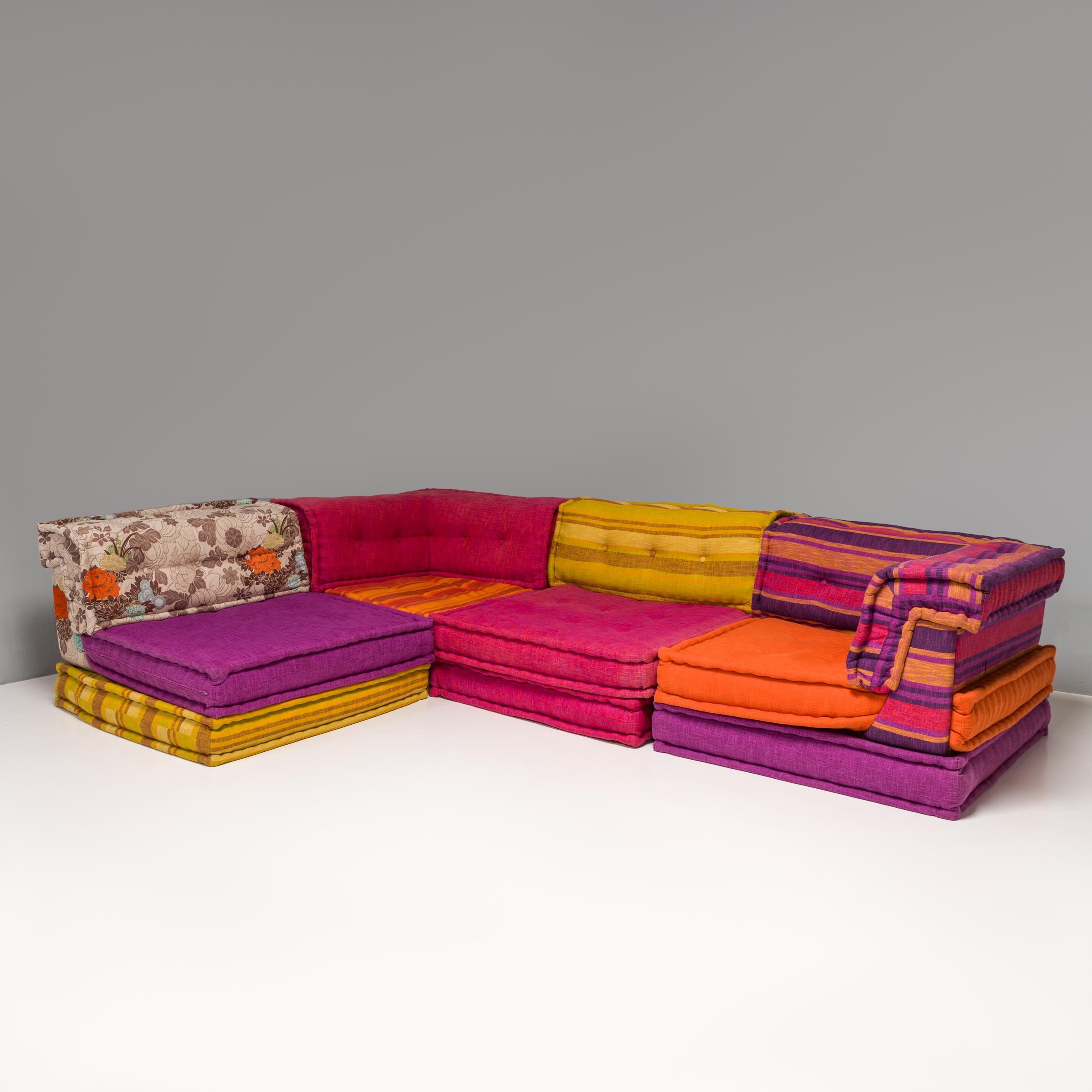 Originally designed by Hans Hopfer for Roche Bobois in 1971, the Mah Jong sofa has become a design classic. 

Comprising twelve pieces, this set is upholstered in a mixture of colours and fabrics to create a bright and bold combination. 

The eight