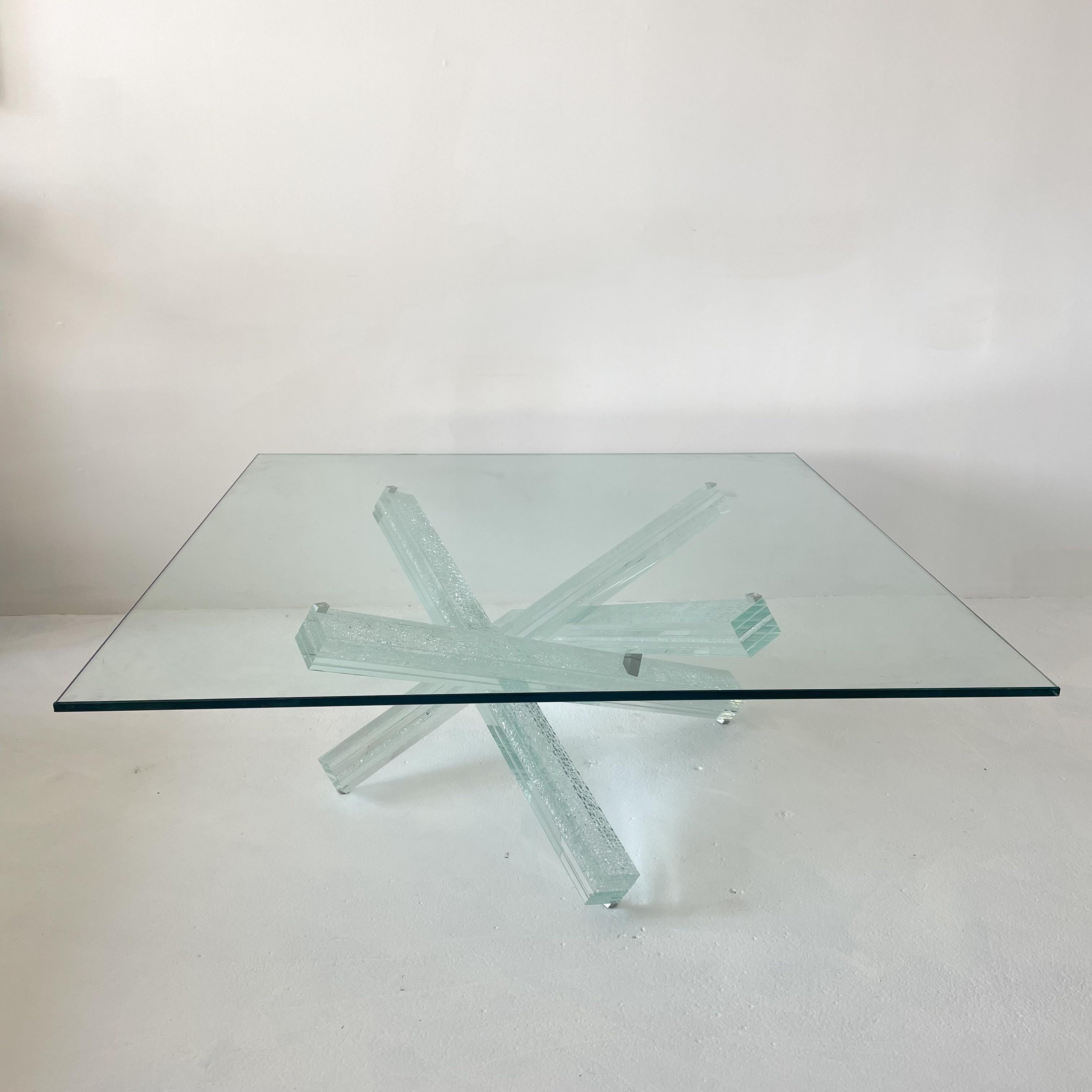 Iconic “Mikado” coffee table designed by Maurice Barilone for Roche Bobois in the 1990s. 

Base is made of layered bars of shattered glass. Top is original glass, whose corner edges are ever so slightly beveled. If another size is desired, another