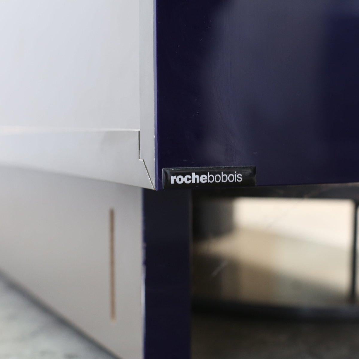 Introducing the Roche Bobois Purple Wave Bar Cabinet, a stunning addition to any luxury home. This elegant piece features a unique wave design across the cabinet doors, adding a touch of sophistication to any space. The cabinet is crafted with