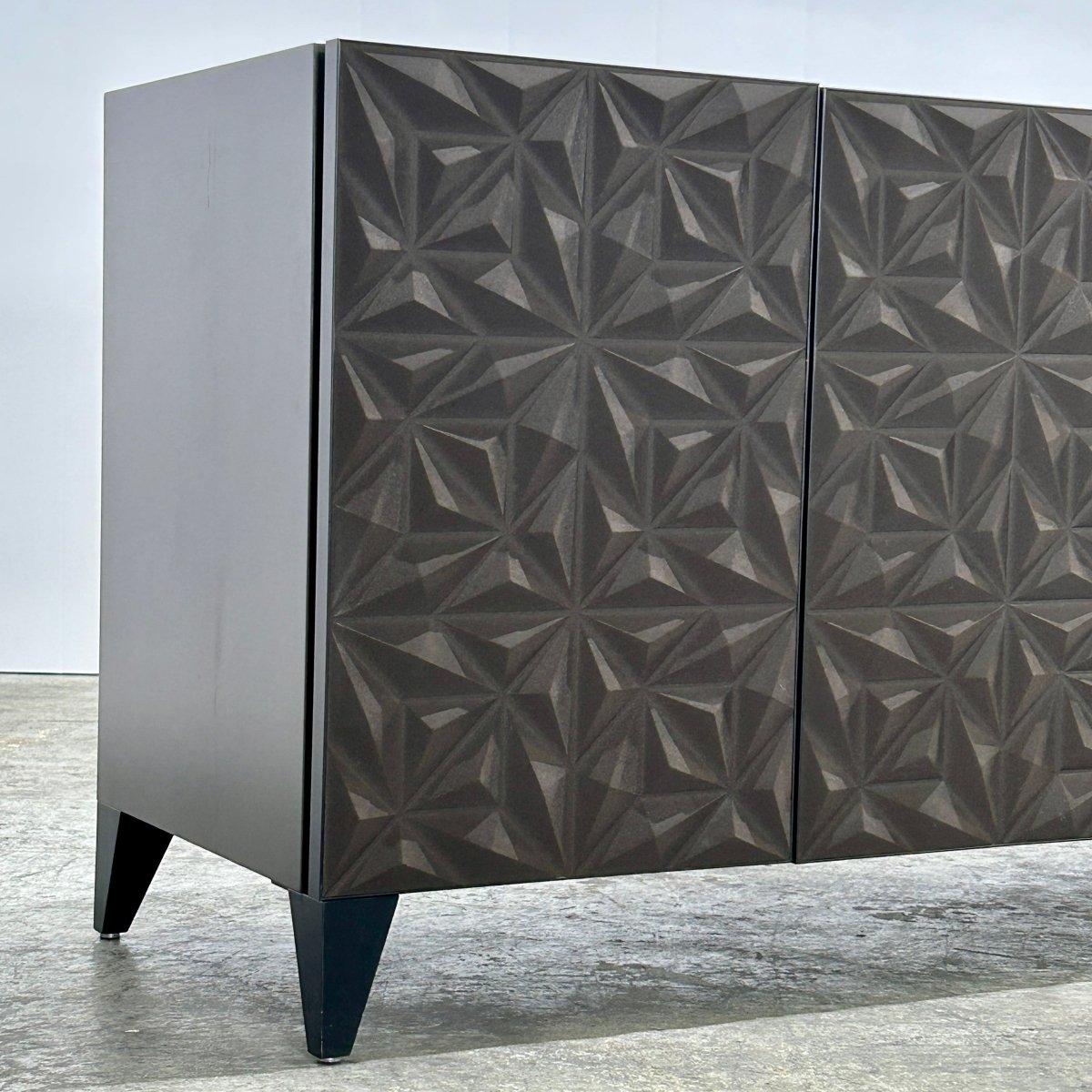 Intricate geometric pattern. With its striking and modern design, the Rosace Sideboard is the perfect addition to any contemporary living space. Its spacious interior provides ample storage for all your dining and entertaining essentials. The