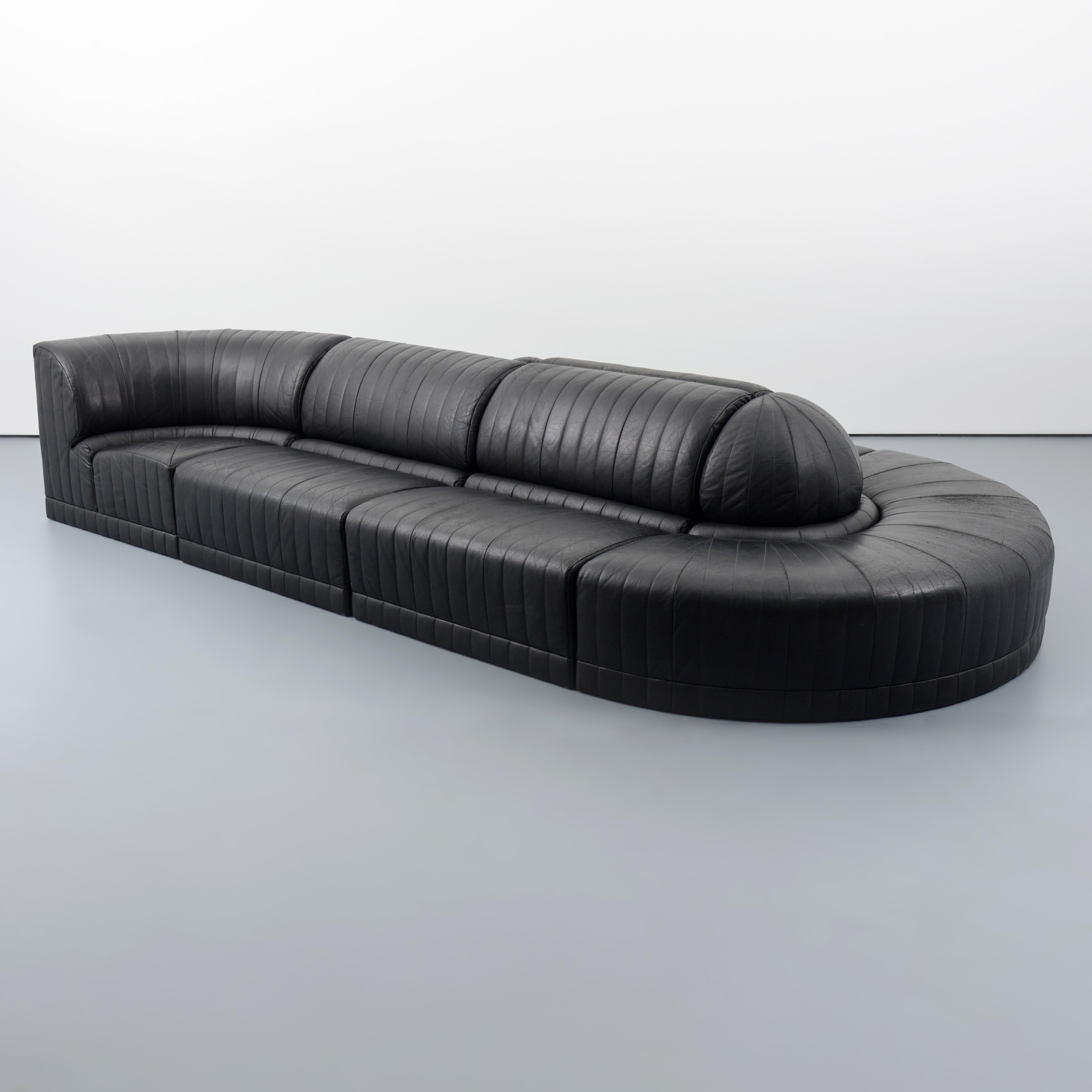 Artist/Designer; Manufacturer: Roche Bobois, France
Marking(s); notes: Roche Bobois label, detached
Materials:  leather
Dimensions (H, W, D): one possible configuration: 29 