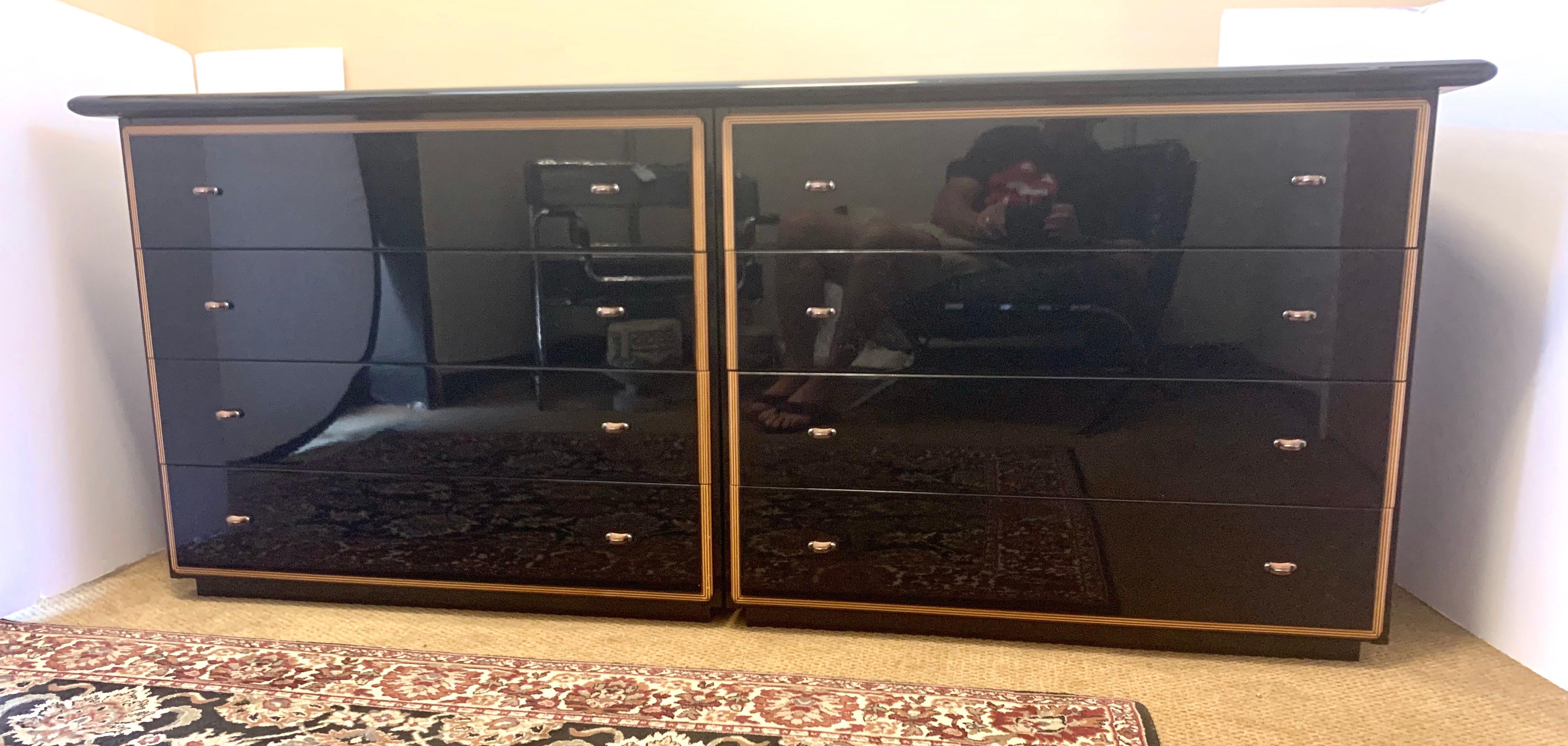 Made in Italy and signed, this black lacquered Roche Bobois dresser can function in several capacities.
The base is two chests that are conjoined by the top piece and make this an eight-drawer case piece perfect for a bedroom, living room, library