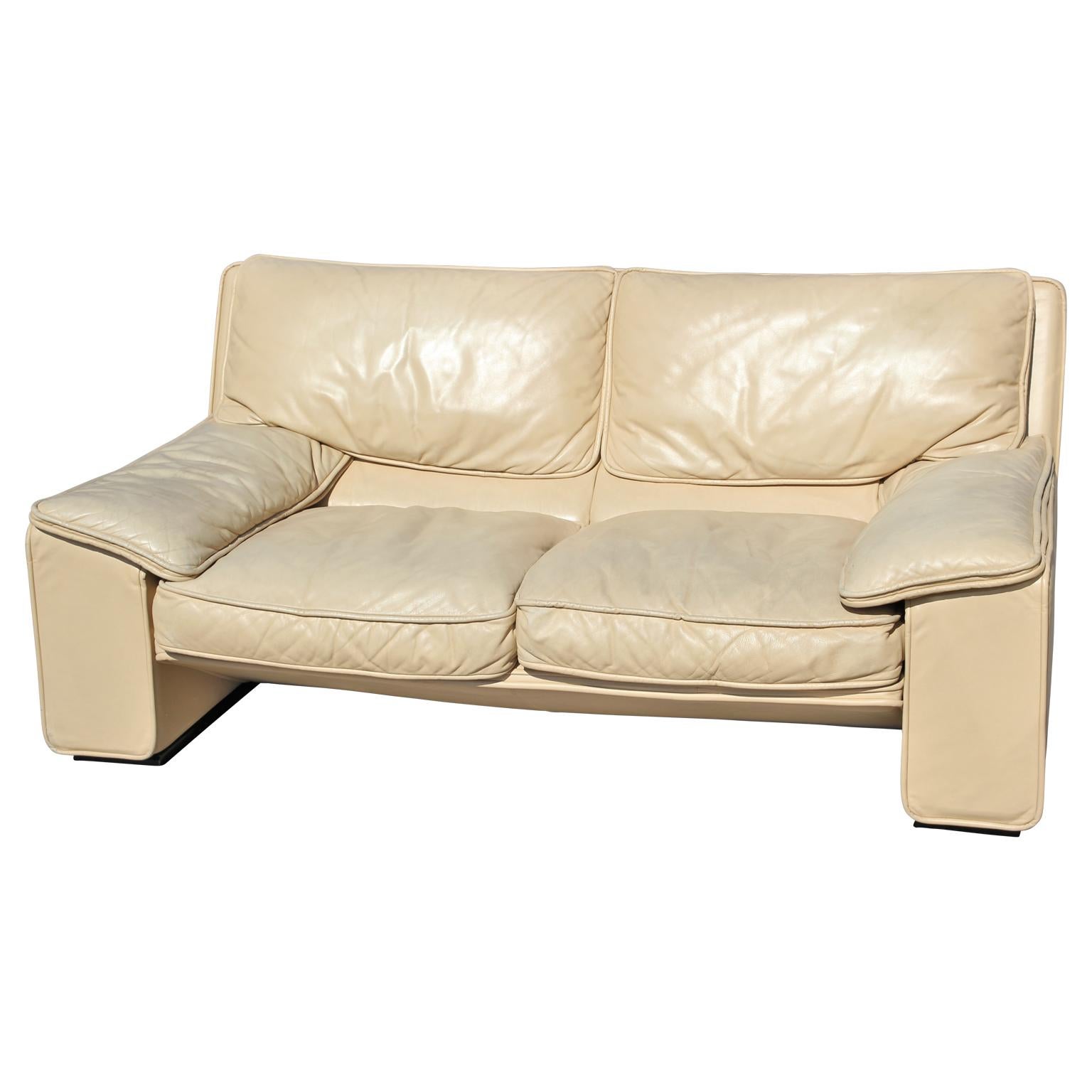 Brunati Postmodern Italian leather two-seat sofa / settee. Light wear too arms and seats. Our leather specialist can restore this for around $750.