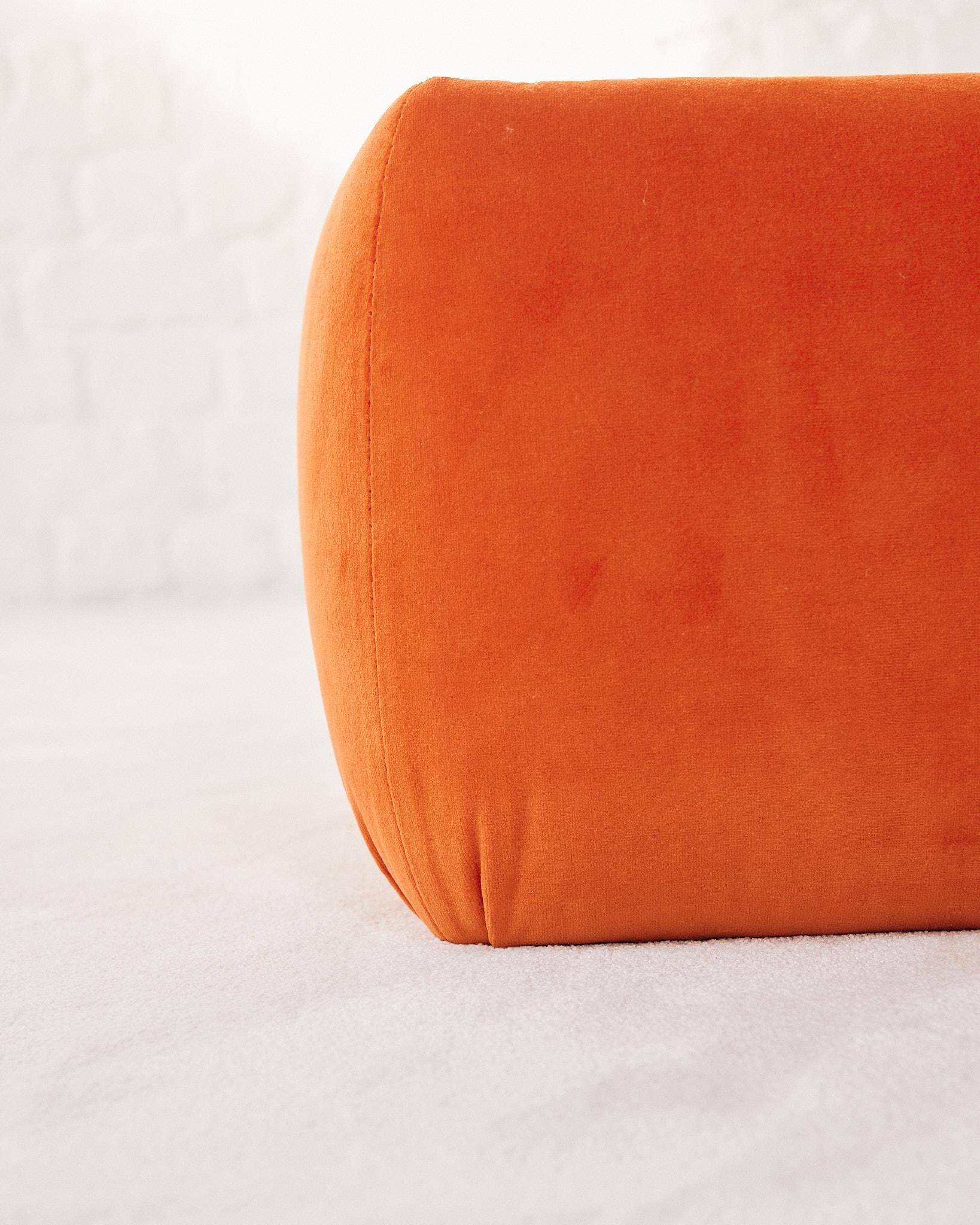 Unique side tables reupholstered in an orange velvet material, with a top aluminium surface. The tables are in style of Roche Bobois.