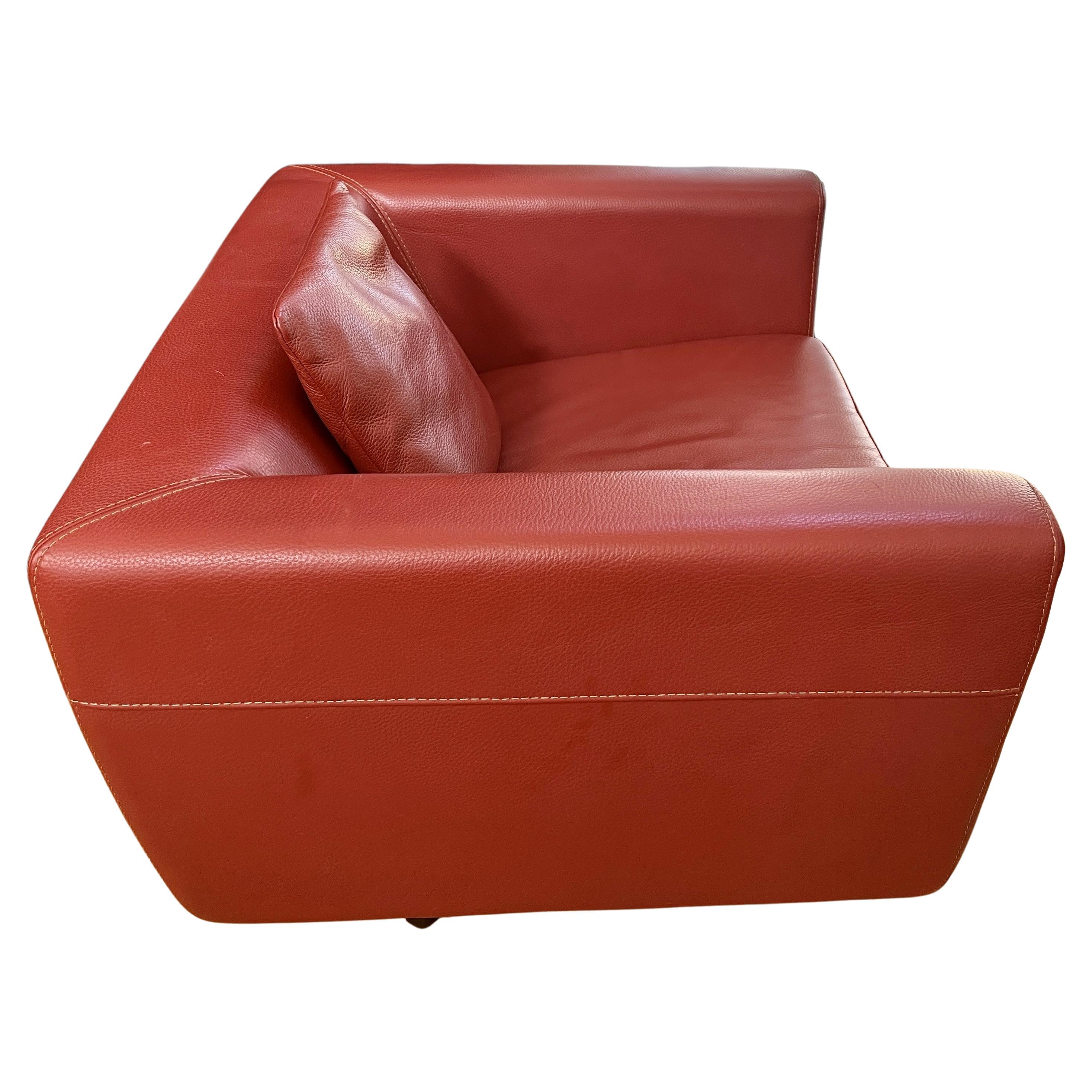 French Roche Bobois Swivel Armchair in Brick Red Leather