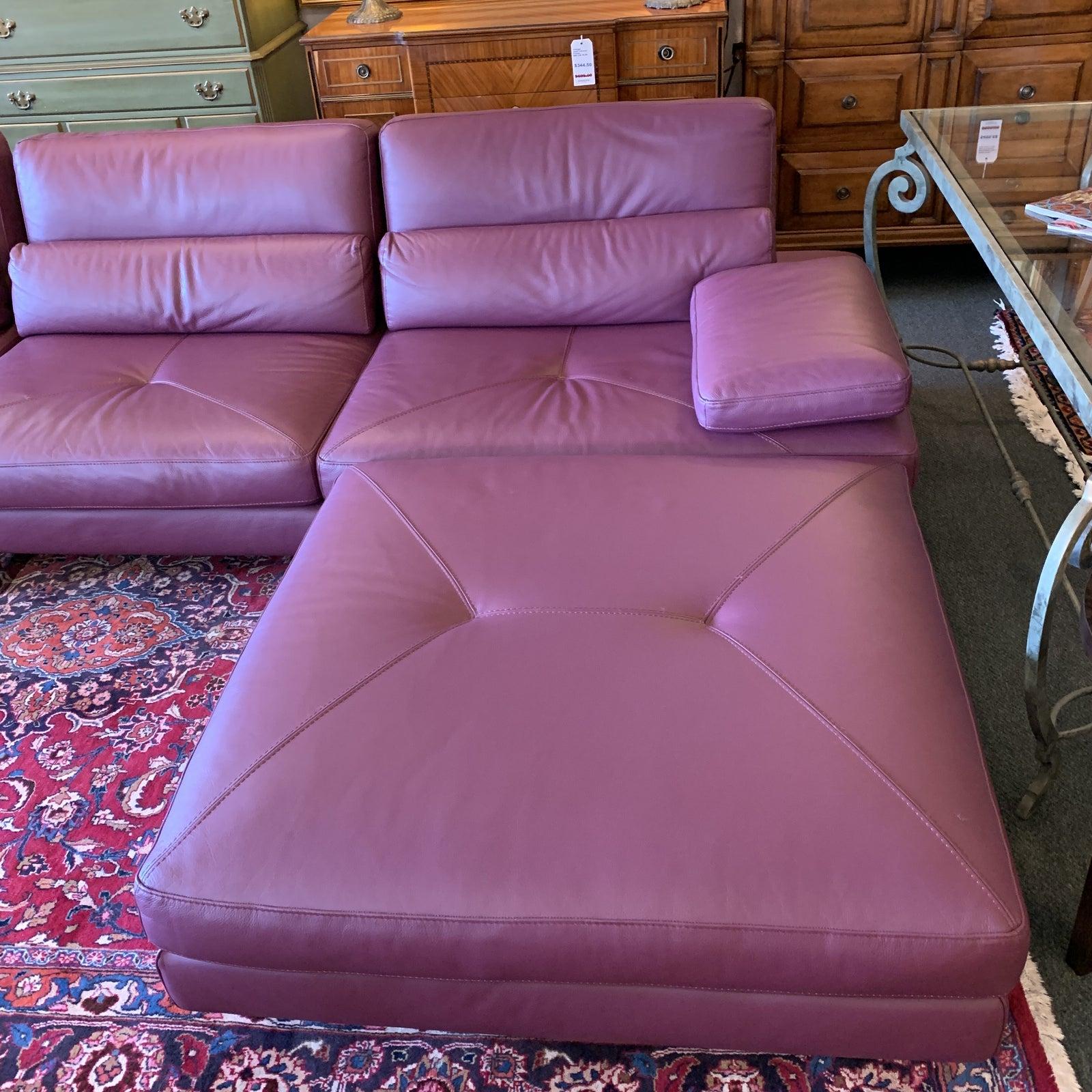 A stunning pulsation leather sectional by Roche Bobois. Contemporary in color and in style, this amazing 3-piece invites lounging. Each back cushion and armrest slides away from the sofa extending the comfort even deeper on its polished chrome base.