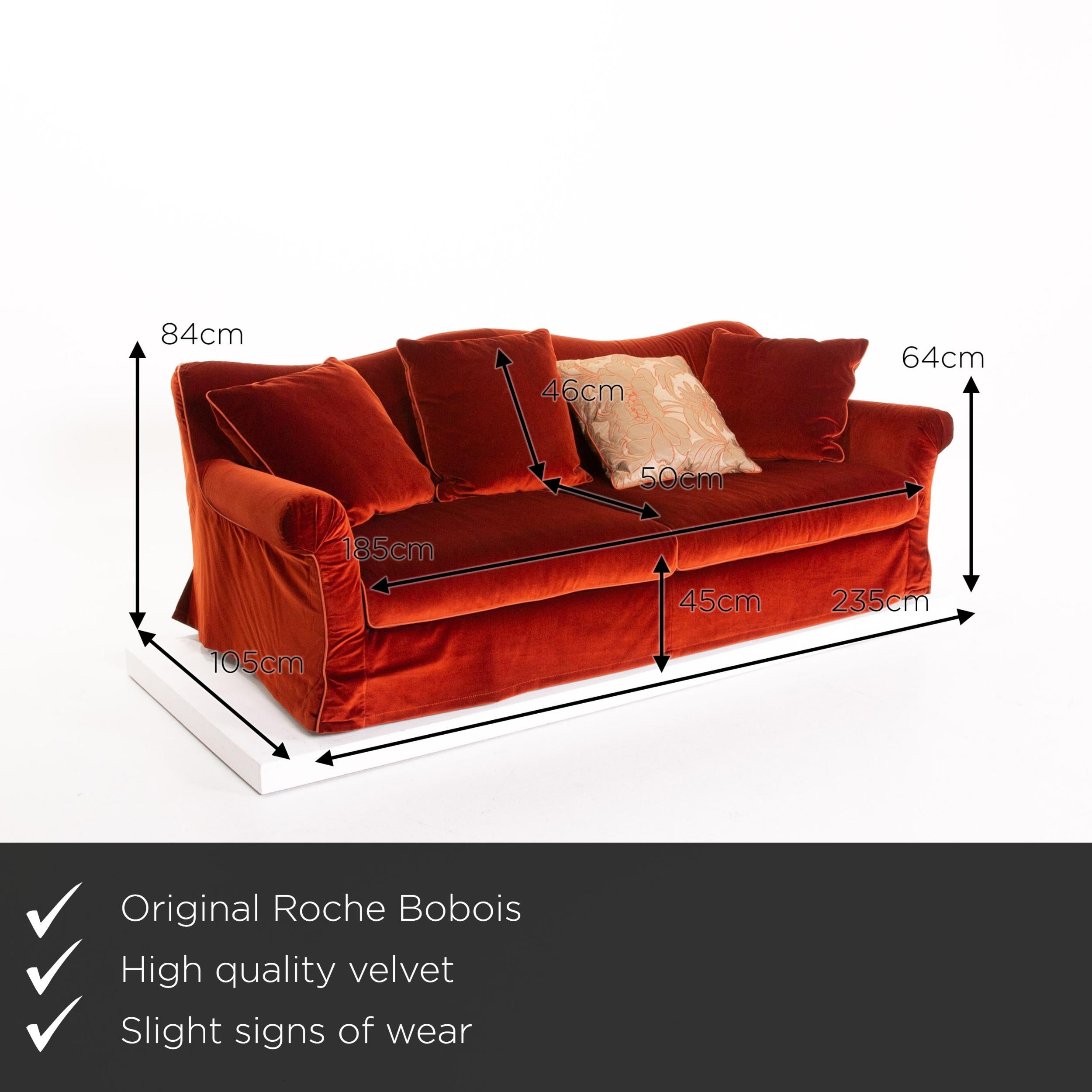 We present to you a Roche Bobois velvet fabric red orange three-seat couch.


 Product measurements in centimeters:
 

Depth 105
Width 235
Height 84
Seat height 45
Rest height 64
Seat depth 50
Seat width 185
Back height 46.
 