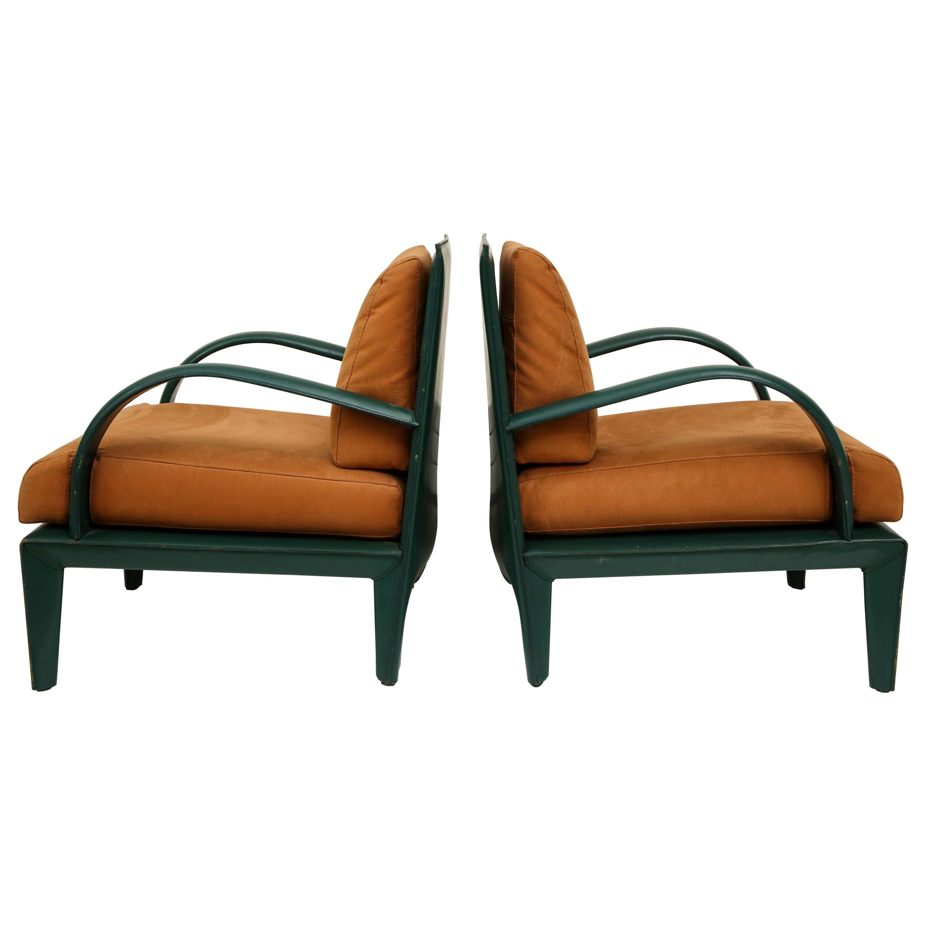 Roche Bobois vintage brown green leather lounge chairs, 1980s, France

Beautiful and heavy 1980s lounge chairs. The green leather is in very good condition and sturdy throughout. The brown ultra suede is a perfect contrast. Very