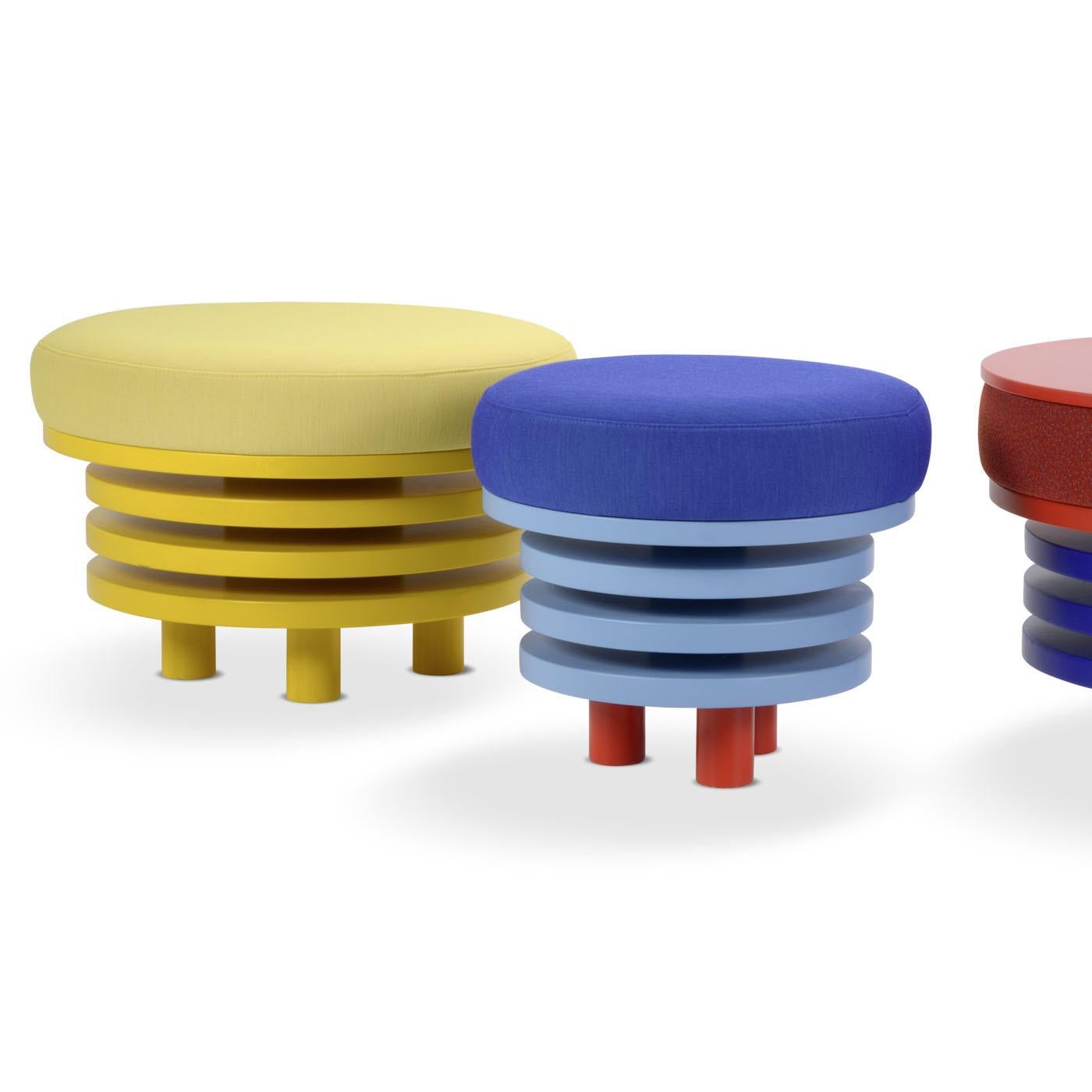 With a simple design, yet remarkable impact, the Roche Pouf has a base in painted beech wood to suit any environment. Offering relaxation, it is all the more comfortable with the harmonious colors available: white, yellow, orange, red, purple, pink,