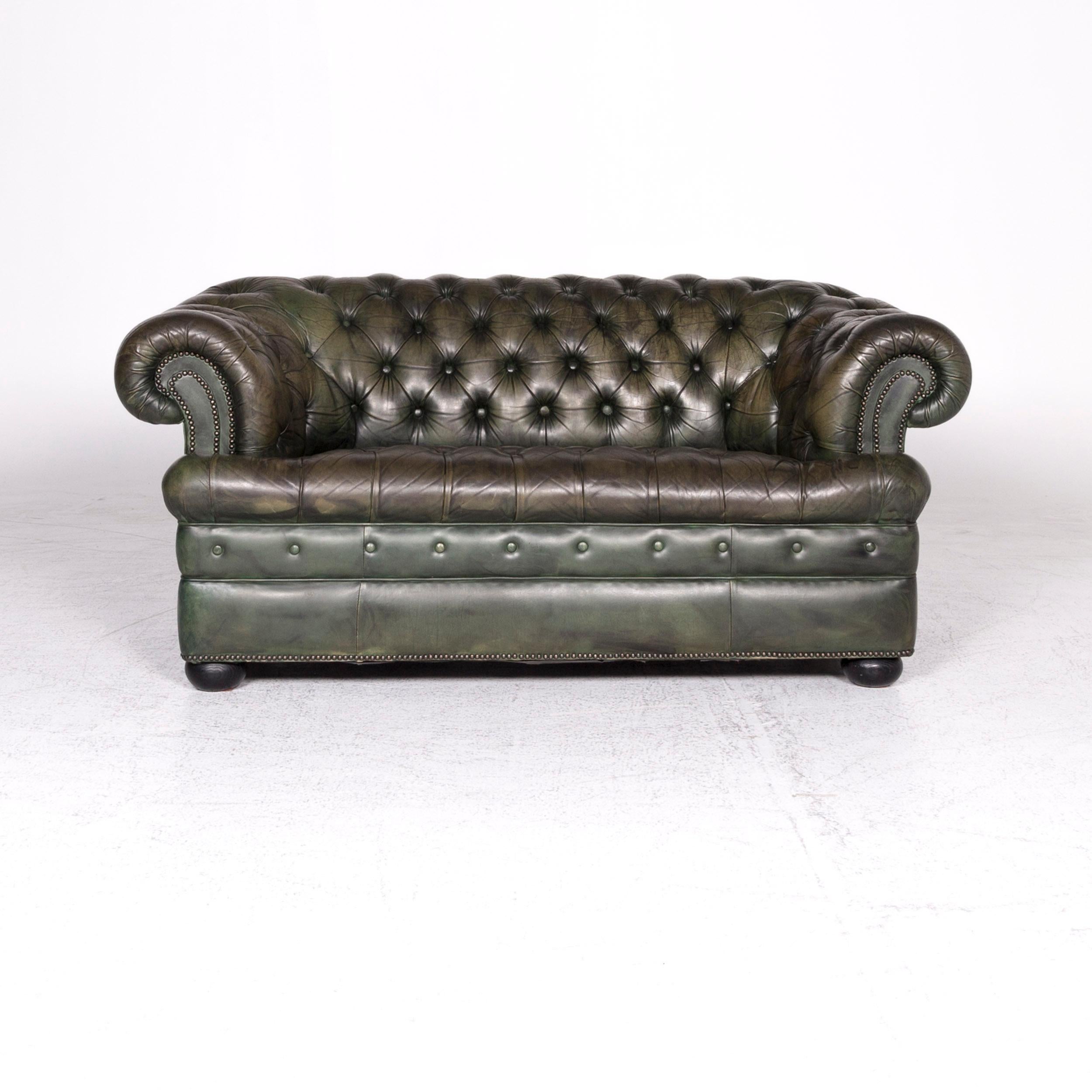 We bring to you a Rochester Chesterfield leather sofa green two-seat couch.

Product measurements in centimeters:

Depth 96
Width 169
Height 78
Seat-height 47
Rest-height 72
Seat-depth 46
Seat-width 101
Back-height 37.
 