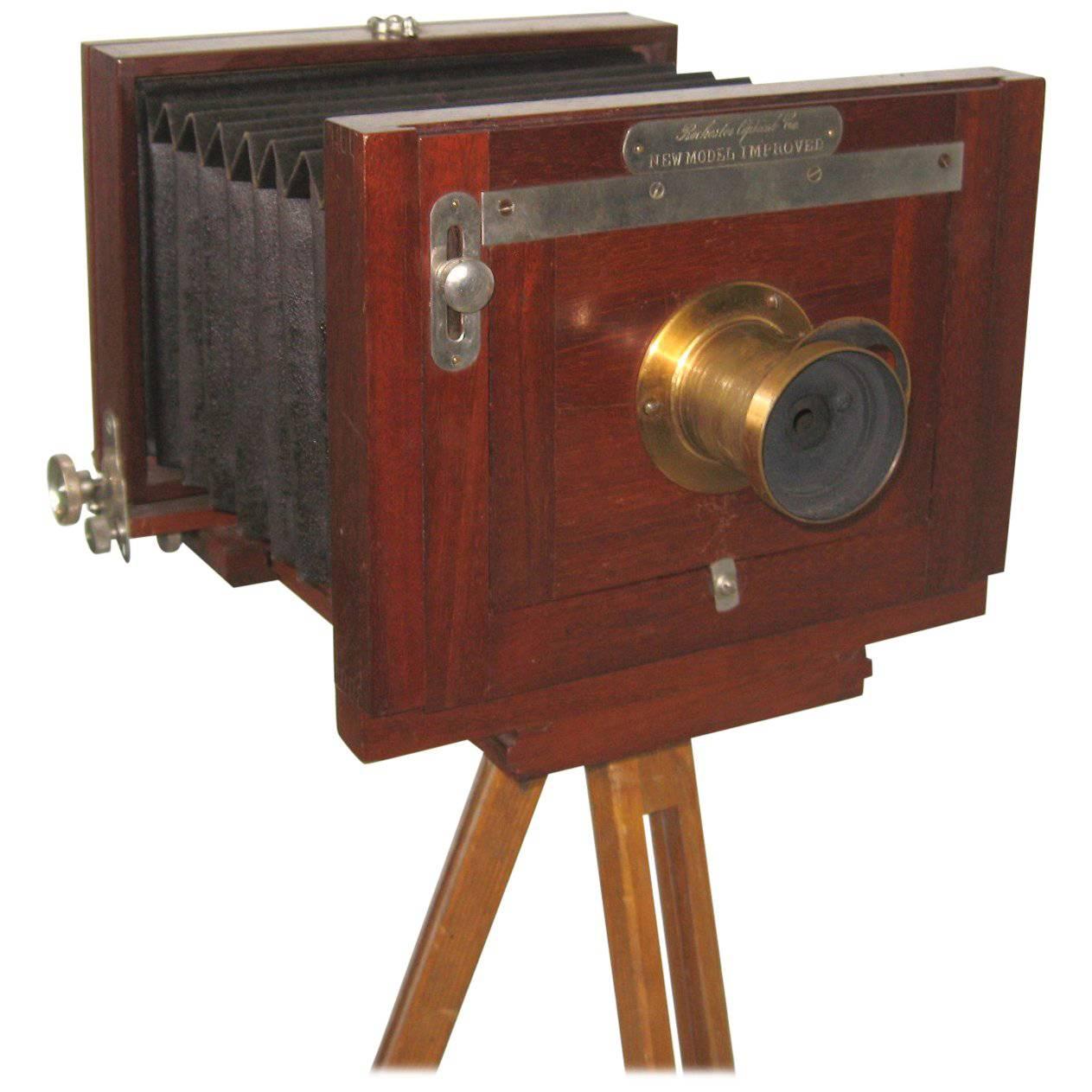 Antique 5 x 7 large format camera with a tripod was made by the Rochester Optical Co. in Rochester, NY. New model improved.
The lens is R O Co 1 1/2 and the original wood caring case. Be sure to check our storefront for many more decorating ideas,