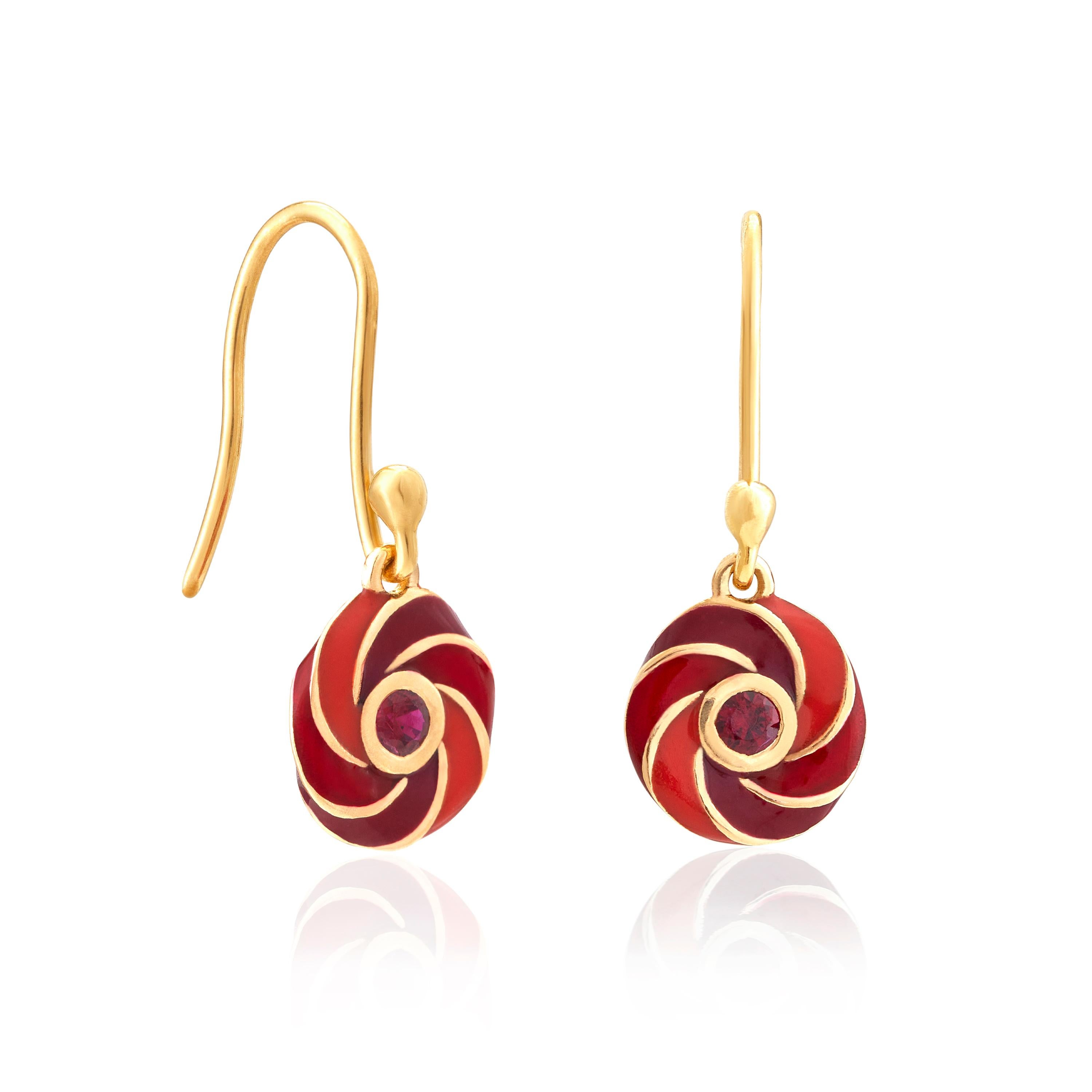 These enticing swirls surround a rich red ruby, inspired by the swirls of colour on rock candy.  A little colour goes a long way and these drop earrings are perfect to add a little je ne said quois to your outfit.  These earrings are made to order