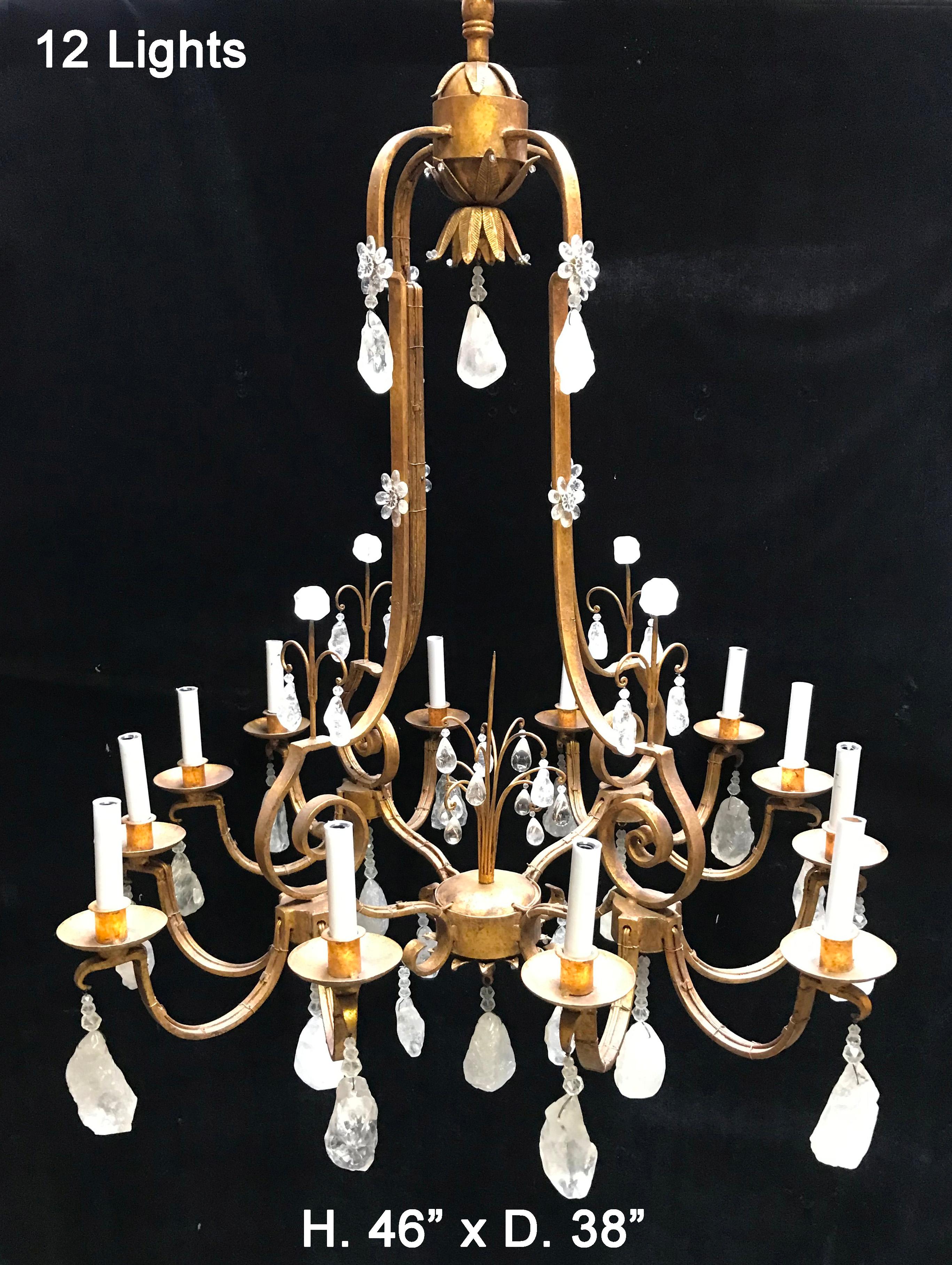 A Venetian style rock crystal nugget and hand forged wrought iron twelve light chandelier with antique gold finish.
Electrified. 

The rock crystal nuggets is a unique and rare shape to have on the chandelier.

Handmade bees wax candle sleeves