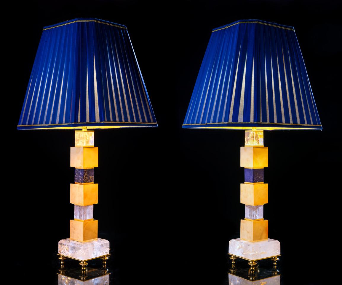 Rock crystal and lapis lazuli pair of lamps.
Limited edition of three pairs.
The lamp has a system of adjustable lamp shade, so you can adjust the height of the lamp shade.
Dimensions:
Base: 4.5 X 4.5 inches
16.5 inches under the lamp