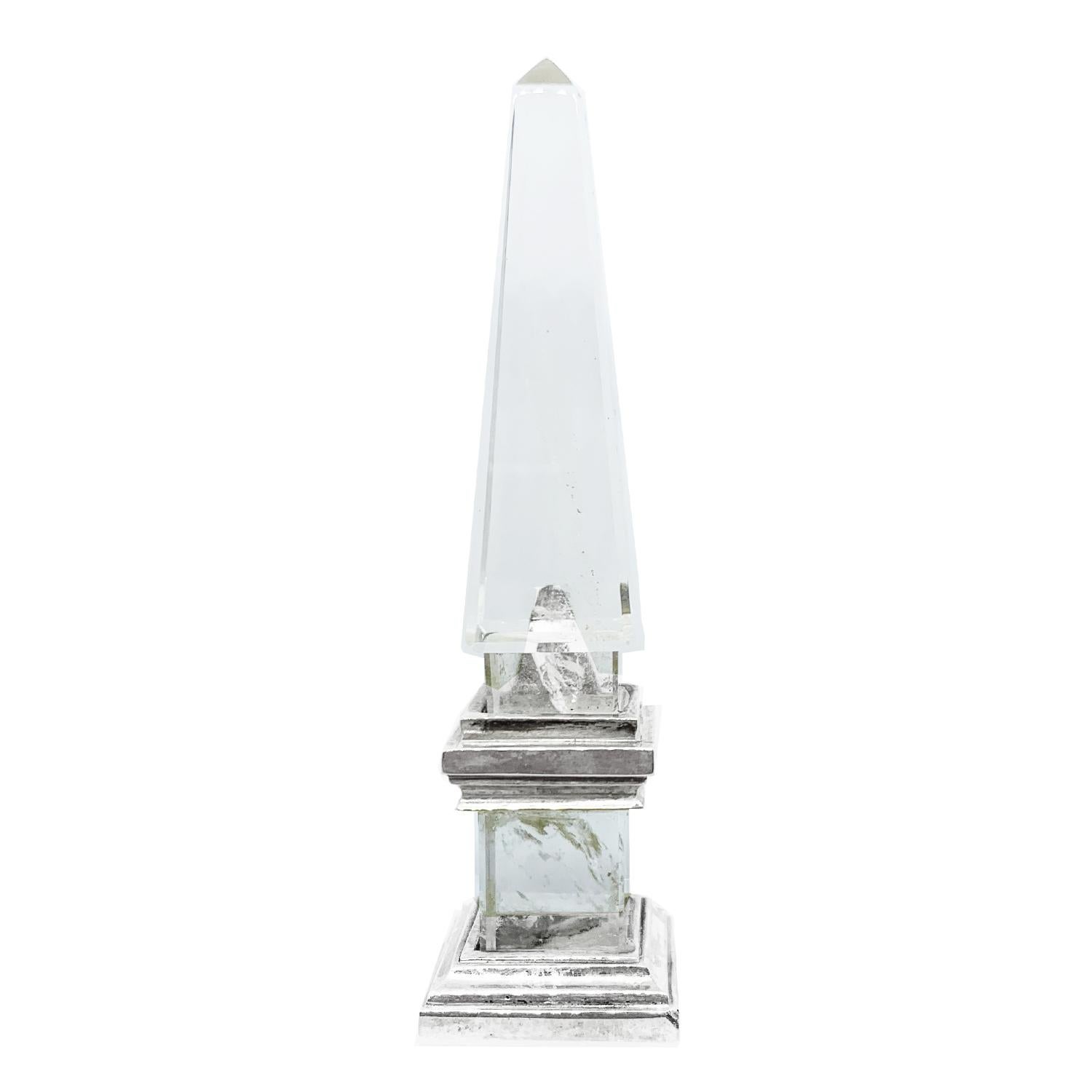 This obelisk in Rock Crystal and Sterling Silver was made by our talented craftsmen. The collection includes 12 different marbles and semi-precious stones that give the table a unique and very elegant look.
Ancient Greeks believed that the gods