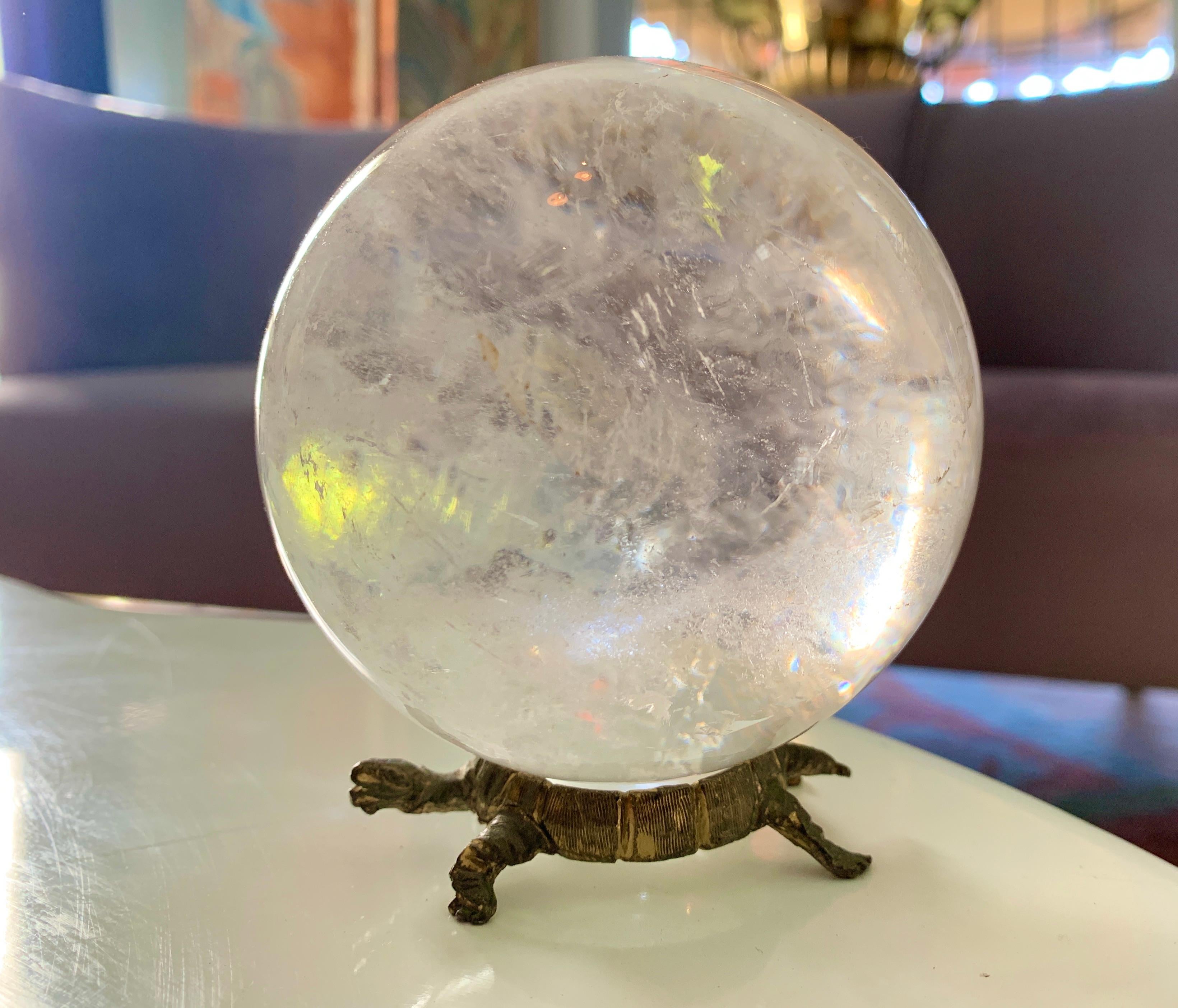 Rock crystal ball on brass turtle base - a wonderful stand alone piece, beautiful rock crystal on a clever turtle base. Also could be used as a paperweight.