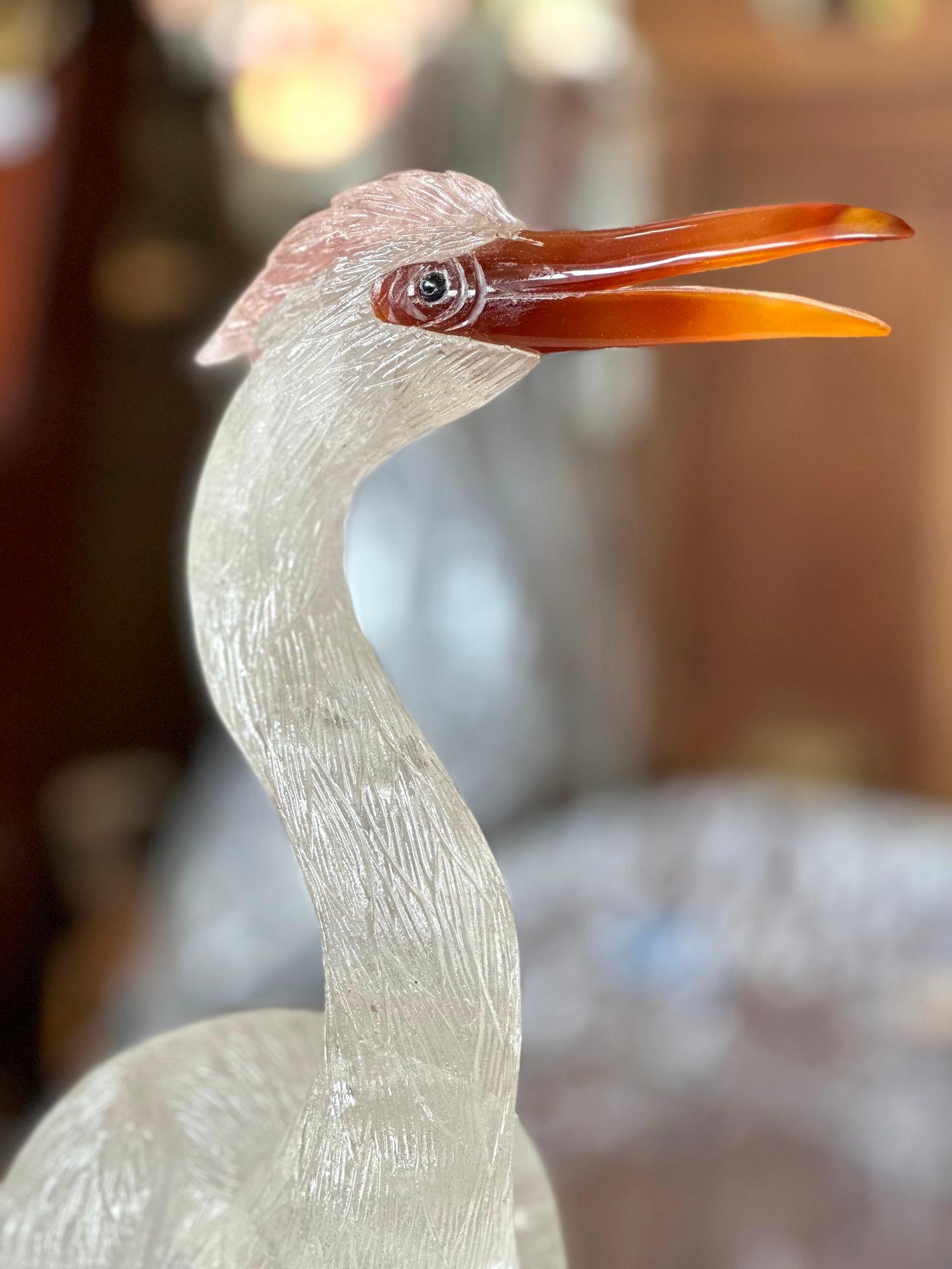 Heron bird sculpture made with rock crystal, agate, amethyst and metal limbs. Stands on a gorgeous amethyst base.