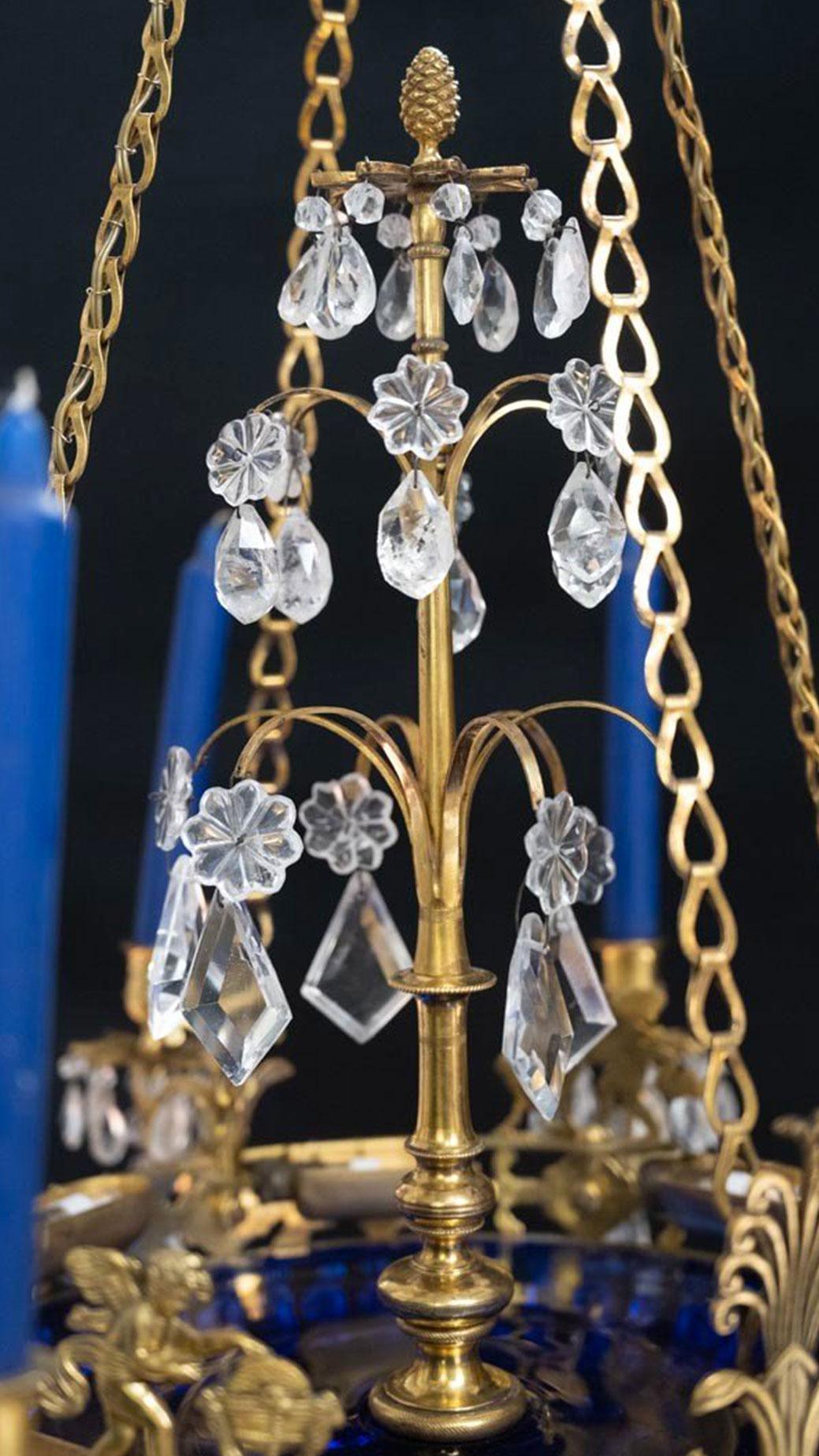 Very elegant cristal rock  and blue glass chandelier, from Sweden. 
Around 1820, in the Empire style.