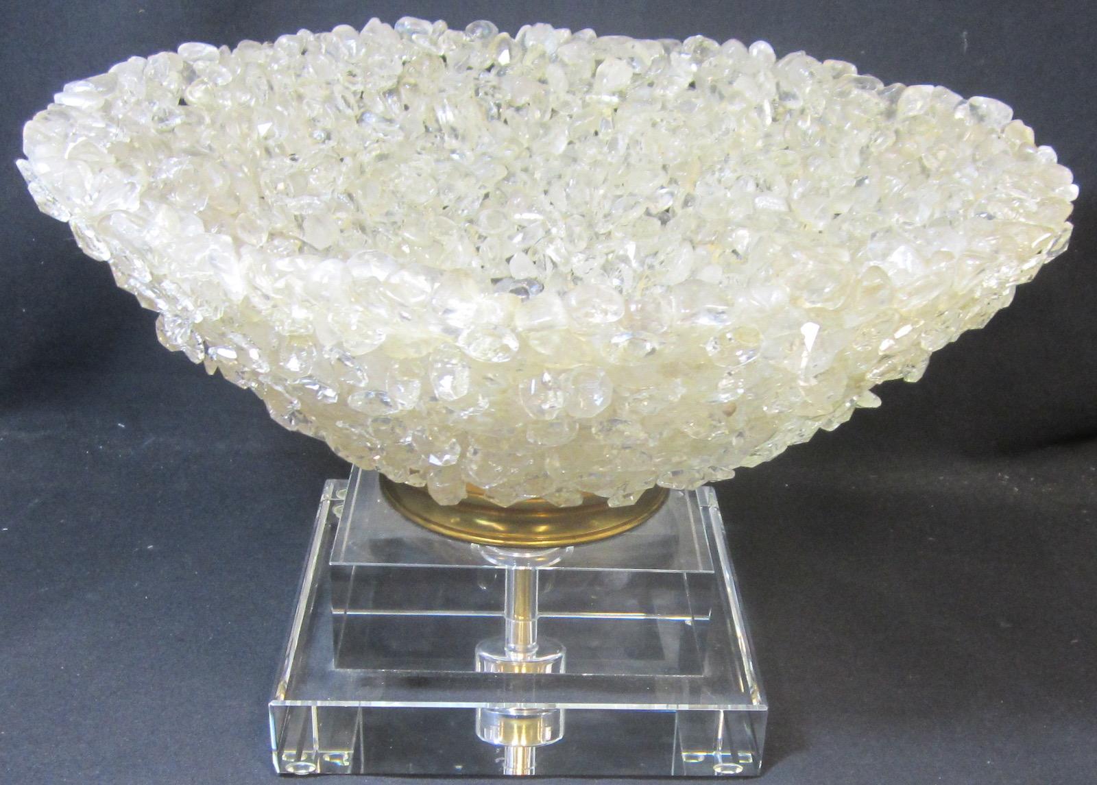 Rock crystal bowl on a glass base with decorative brass accents.
Our eclectic stock crosses cultures, continents, styles and famous names.
 