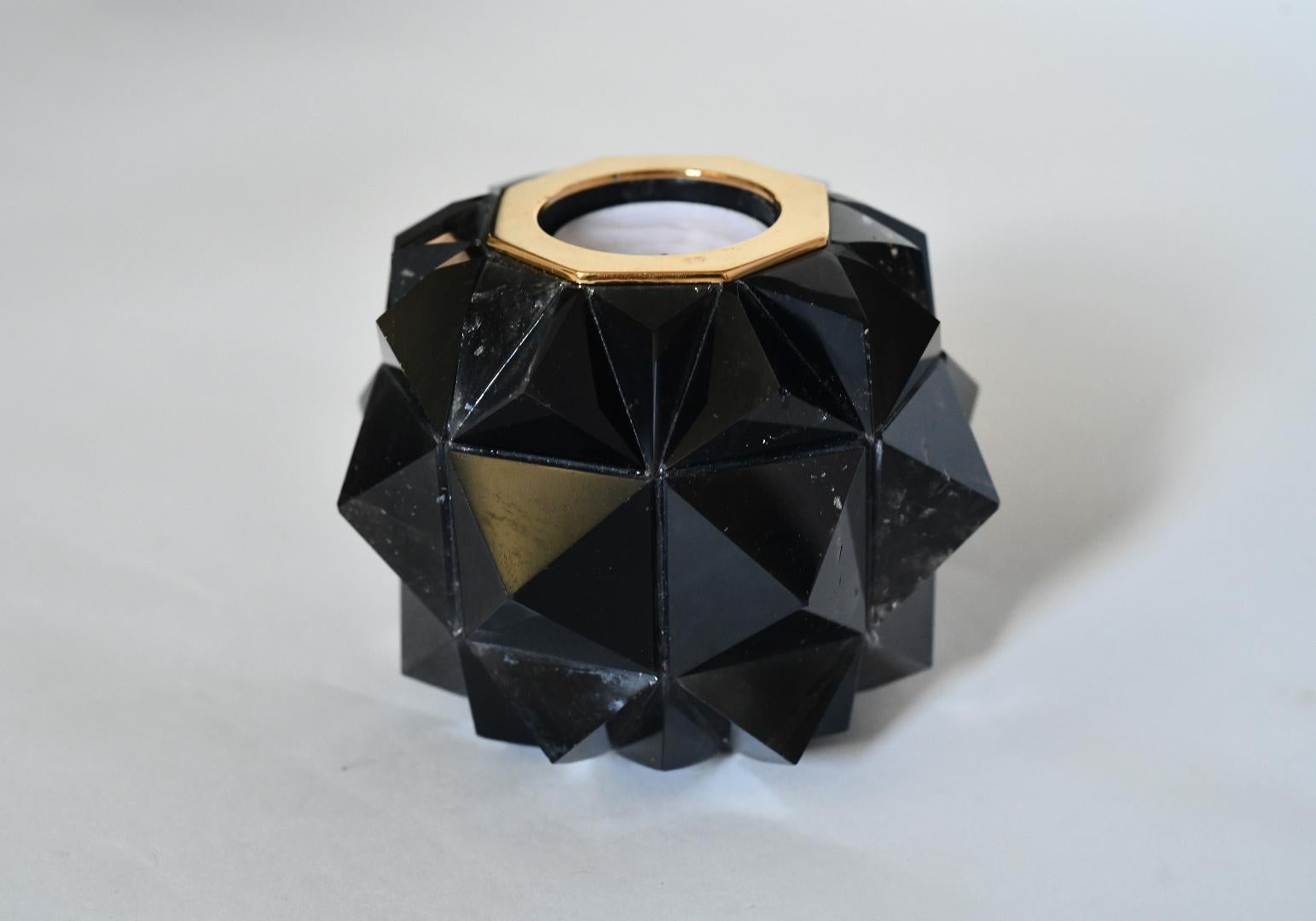 Multifaceted dark rock crystal candleholder. Created by Phoenix Gallery.