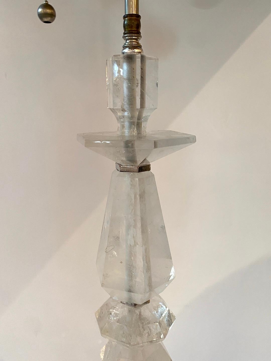 Rock Crystal from Madagascar in the form of a Neoclassical designed lamp. Silver metal spacers and base plate. New 18