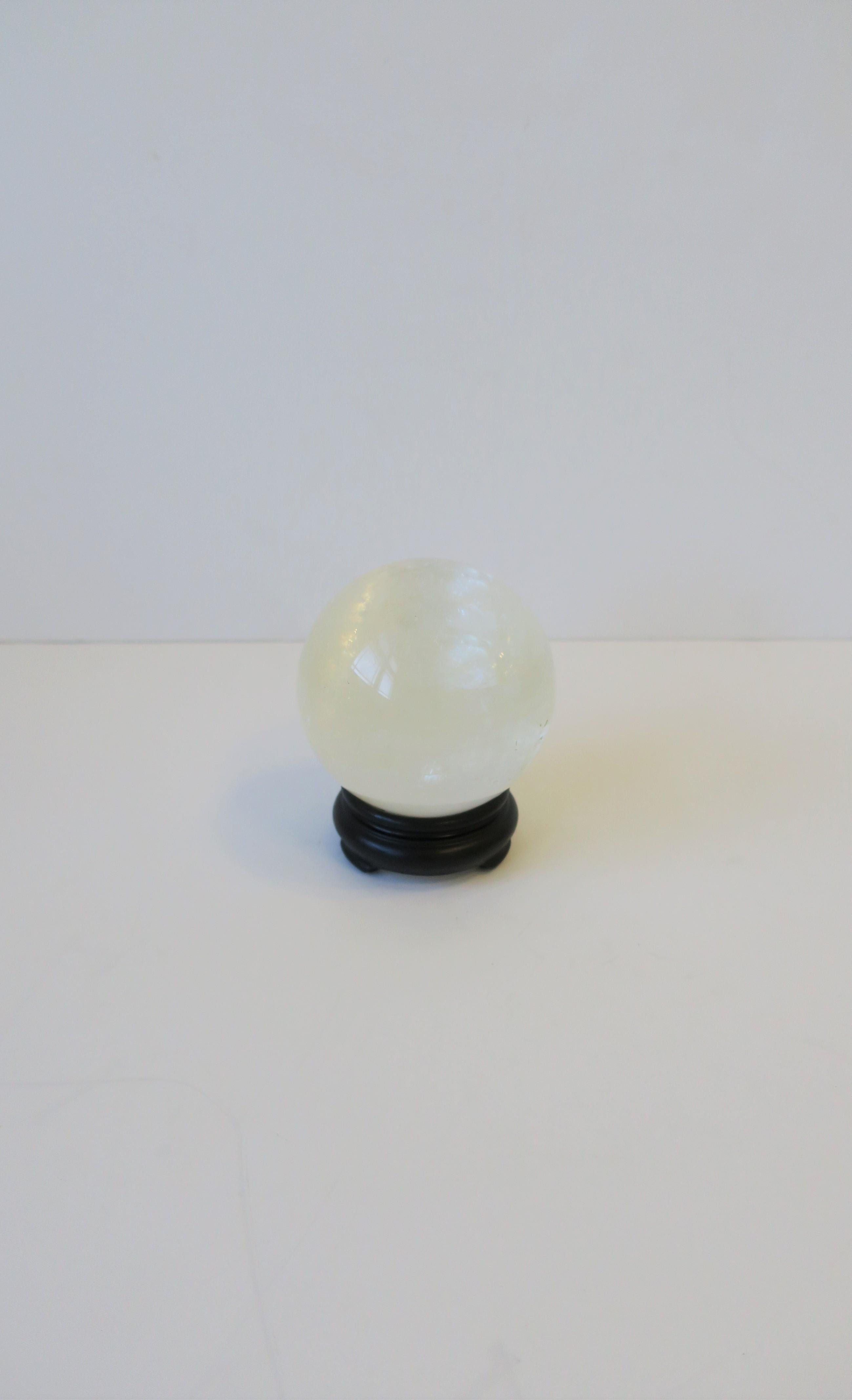 Polished Rock Crystal Decorative Sphere with Black Base