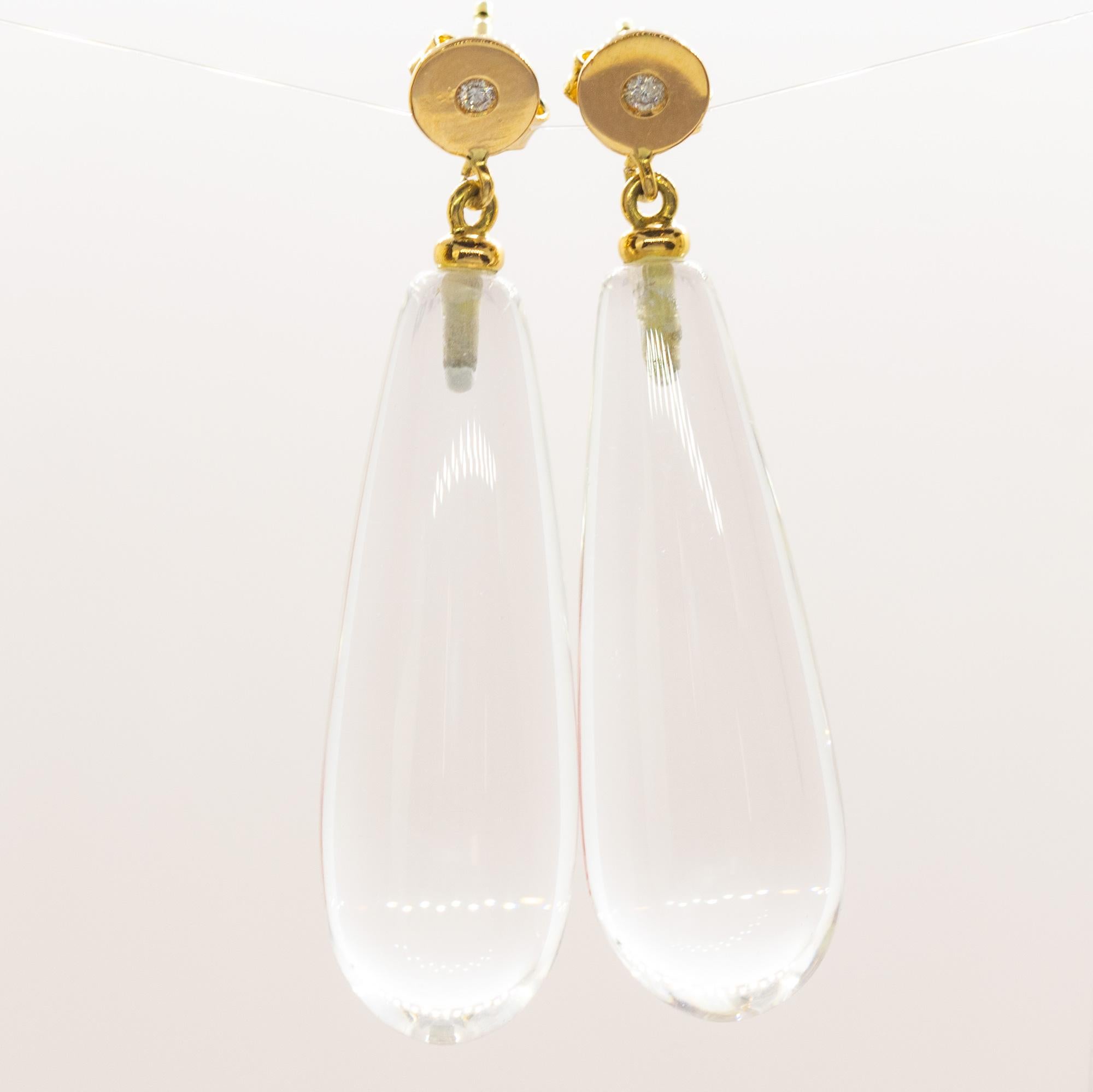 Italian handcarved earrings full of design and beauty. Marvellous rock crystal and diamonds dangle drop earrings. Decorated by precious 1.8 g 18 karat yellow gold. The perfect jewel for a summer day full of sun and smiles. Teardrop, dangle and