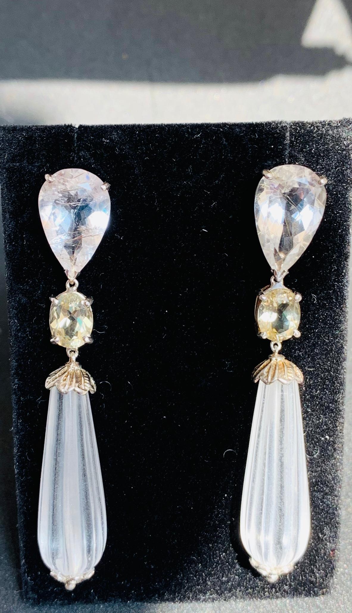 Sabrina Balsky Jewelry
Handmade  Sparkling Rutile Quartz Pear shaped Drop Earrings with Andesine Labradorite centre detail and Rock Crystal drops set in Sterling details with Rhodium Plating.  Earrings are 2-7/8