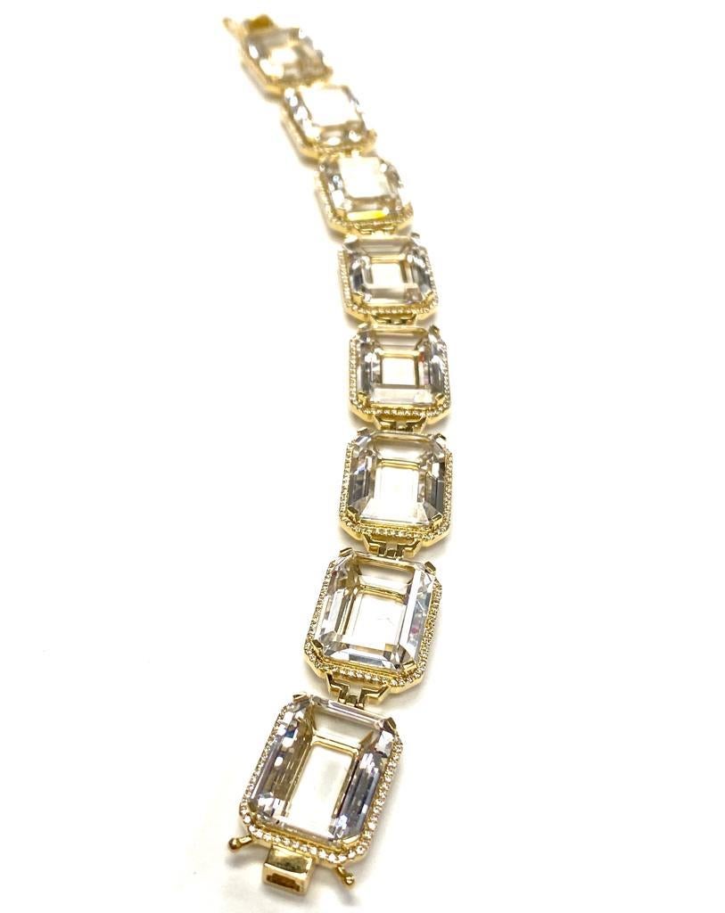 Rock Crystal Emerald Cut Bracelet with Diamonds in 18k Yellow Gold, from ' Gossip' Collection

Stone Size: 16 x 12 mm

Gemstone Weight: 76.44 Carats

Diamonds: G-H / VS, Approx Wt: 1.2 Carats