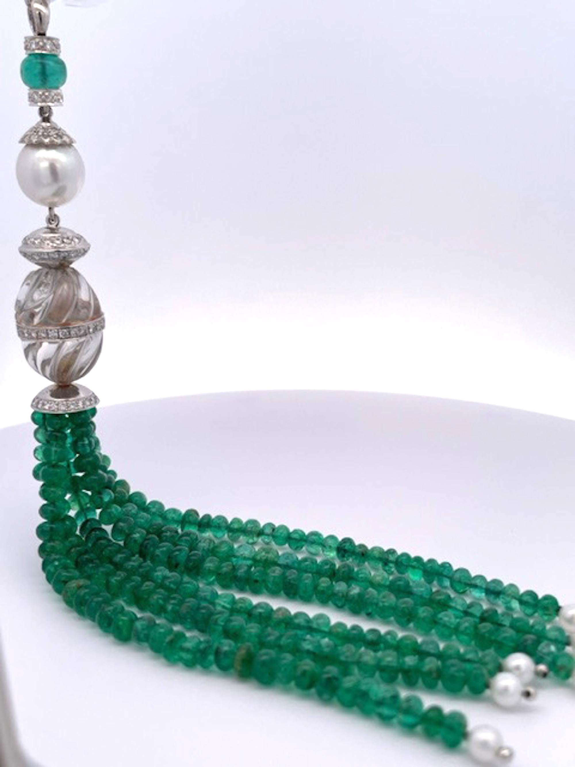 This rock crystal Emerald and Diamond tassel is special and was made for me about 5 years ago.  I wear it on a beaded Emerald Chain.  This necklace enhancer consists of a Large Pearl with a Diamond studded cap, a fluted Rock Crystal with a Diamond