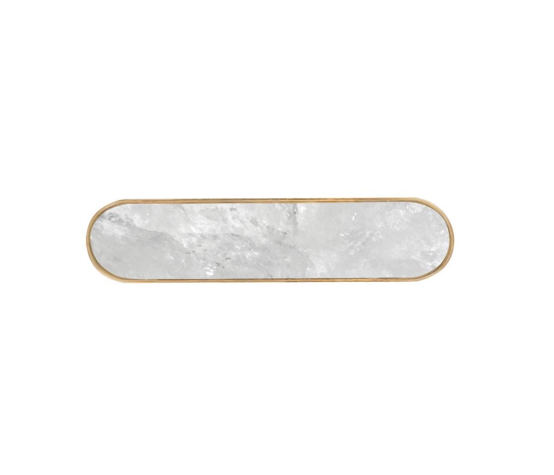Rock crystal handle with polish brass decoration. Created by Phoenix Gallery NYC.
Size, and finish upon request.