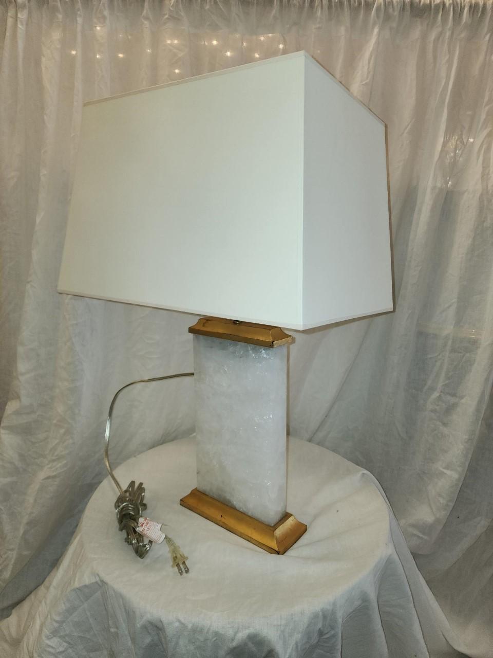 Beautiful Rock Crystal table lamp. Modern in style this piece is preowned with minor wear and tear. Perfect accent piece for any room.