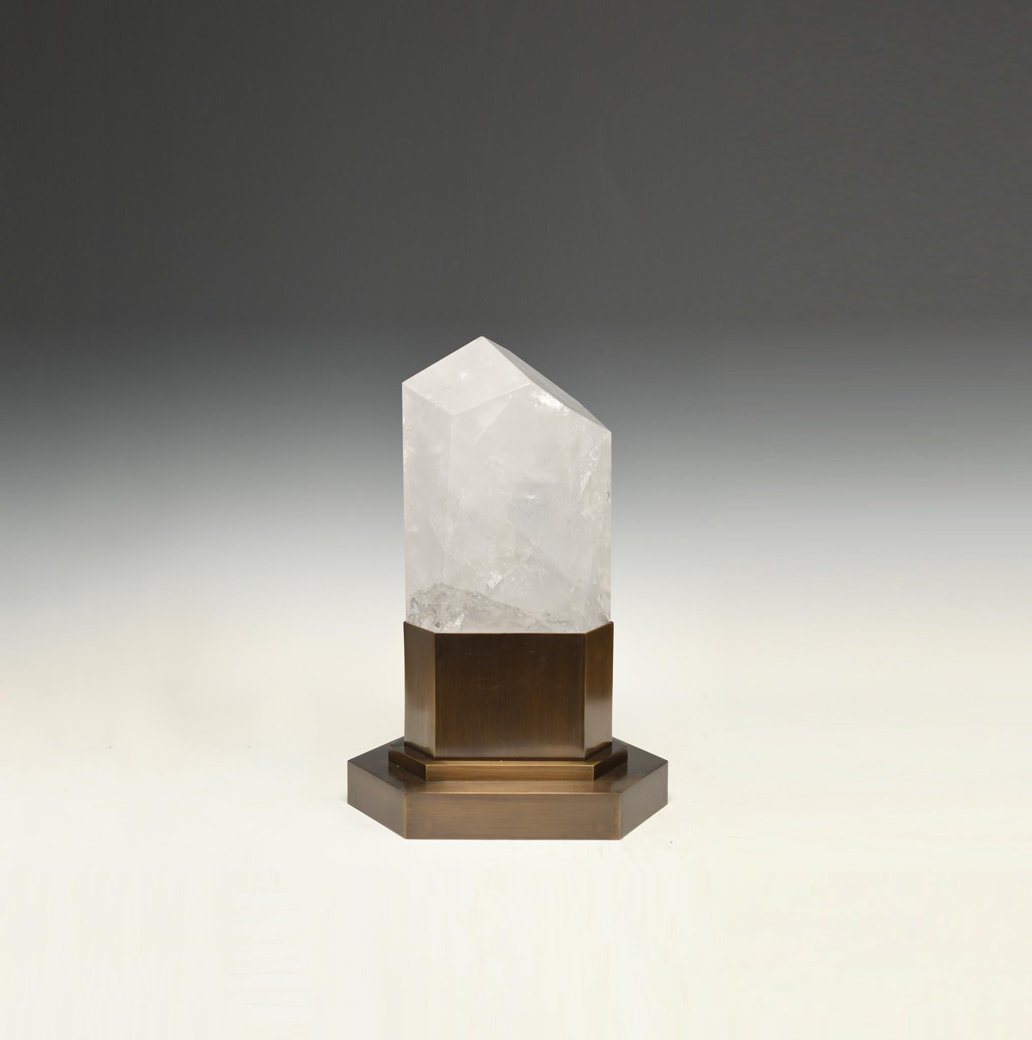 A rock crystal obelisk light with antique brass base. Created by Phoenix Gallery, NYC. 
Two sockets installed. Supply two led warm lights. 120w max.
Custom size available.