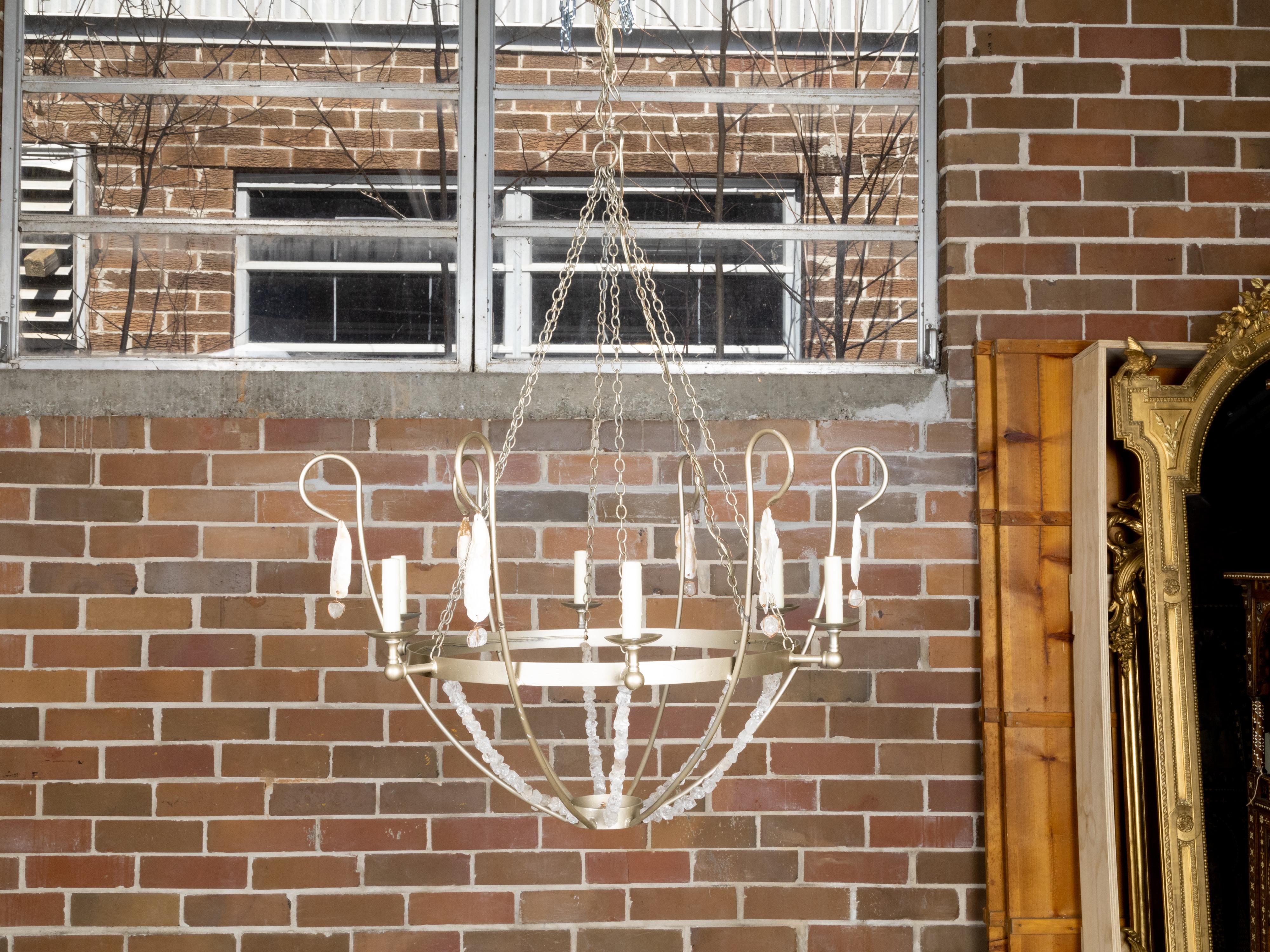A vintage American six-light rock crystal, oyster basket chandelier, professionally rewired for the USA. This exquisite vintage American six-light chandelier captivates with its unique combination of rock crystal and oyster shell accents, creating a