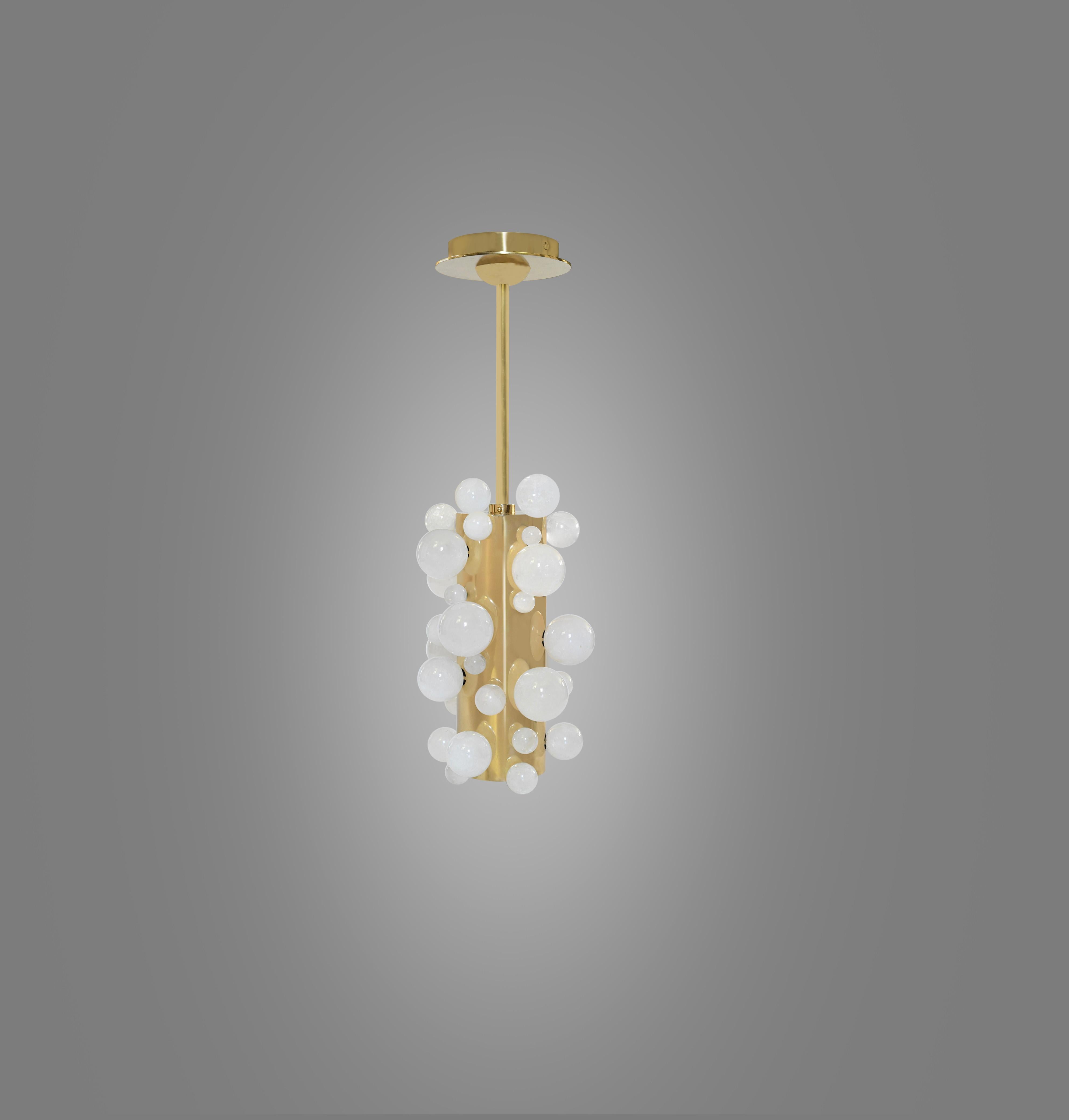 Rock crystal bubble pendant light with polished brass finish. Created by Phoenix Gallery, NYC.
Two sockets installed. Use LED warm light bulbs. 50w each. 100 w total.
Dimension of the pendant: 8