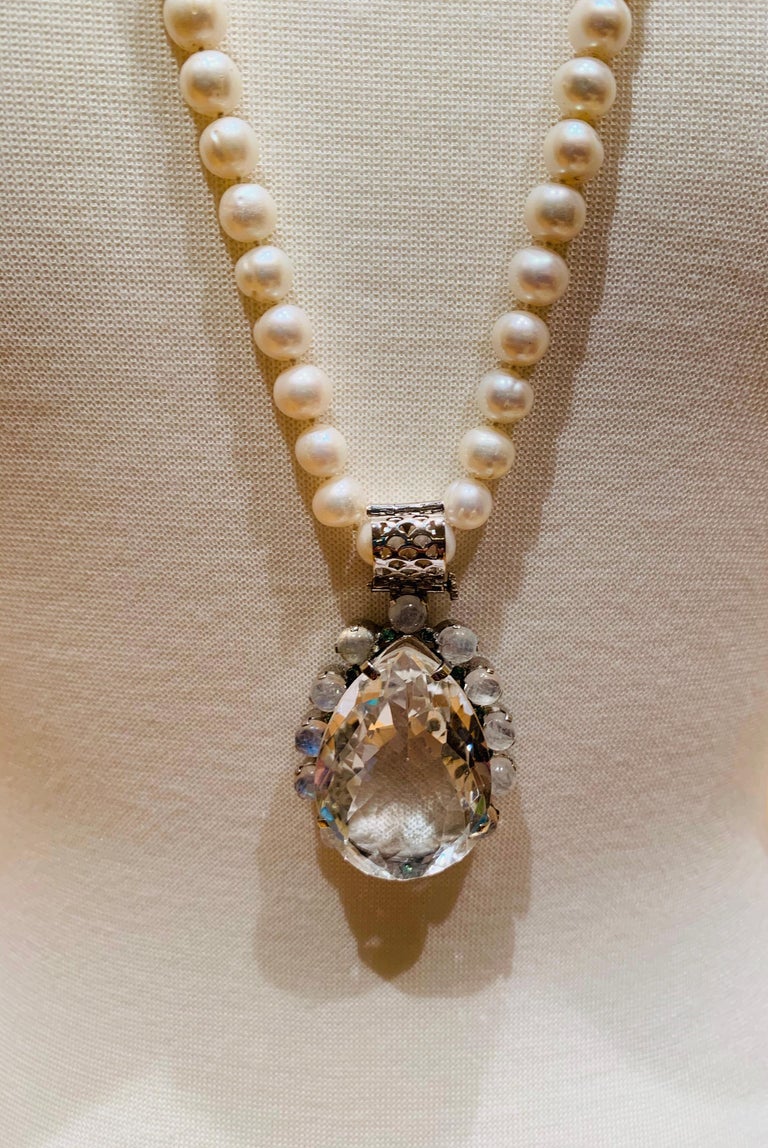 114 Carats Rock Crystal Pendant Necklace with Tsavorites and Moonstone
