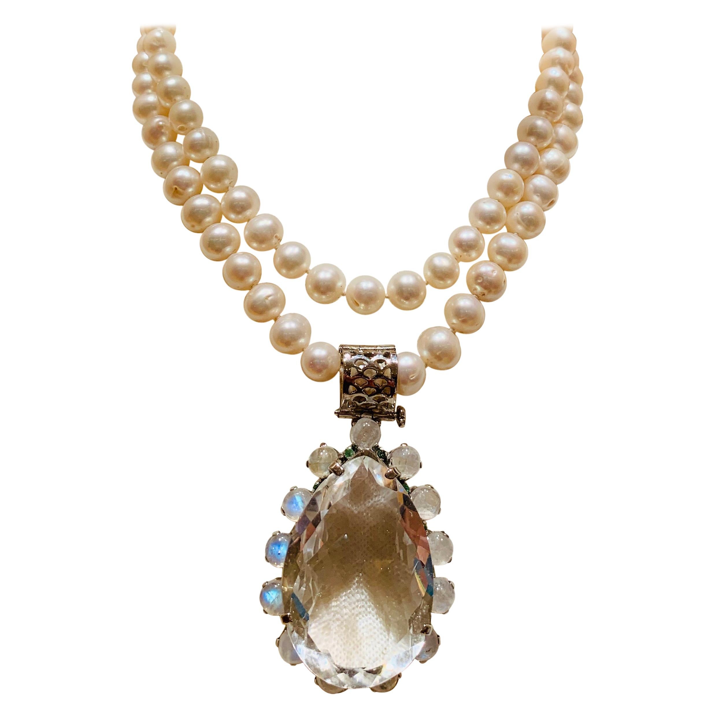 114 Carats Rock Crystal Pendant Necklace with Tsavorites and Moonstone