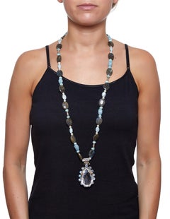 114 Carats Rock Crystal Pendant Necklace with Tsavorites and Moonstone