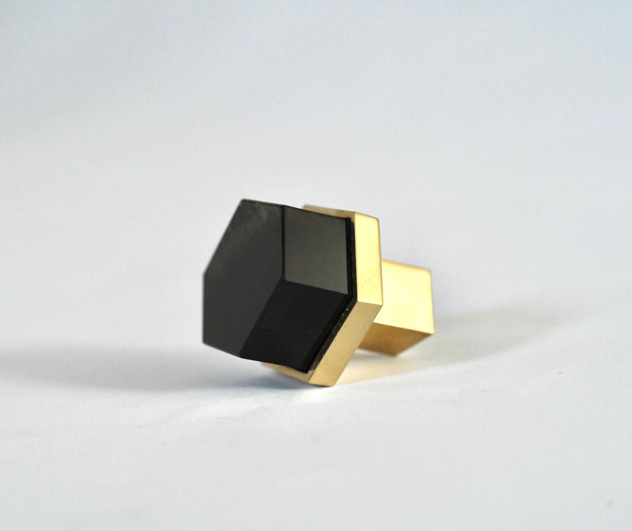 Flat hexagon form smoky rock crystal quartz knob with polished brass base. Created by Phoenix Gallery, NYC.
Custom size and finish upon request.