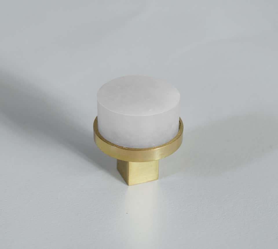 Circular form rock crystal quartz knob with polished brass base. Created by Phoenix Gallery, NYC.
Custom size and finish upon request.