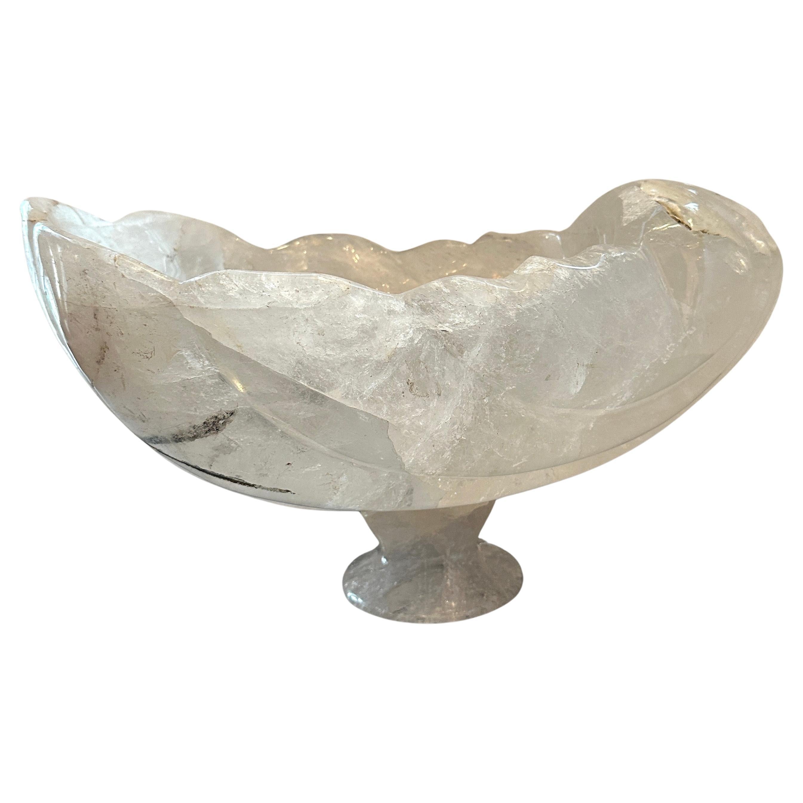 Magnificent hand carved rock crystal bowl in the shape of a shell.  Modern fabrication.